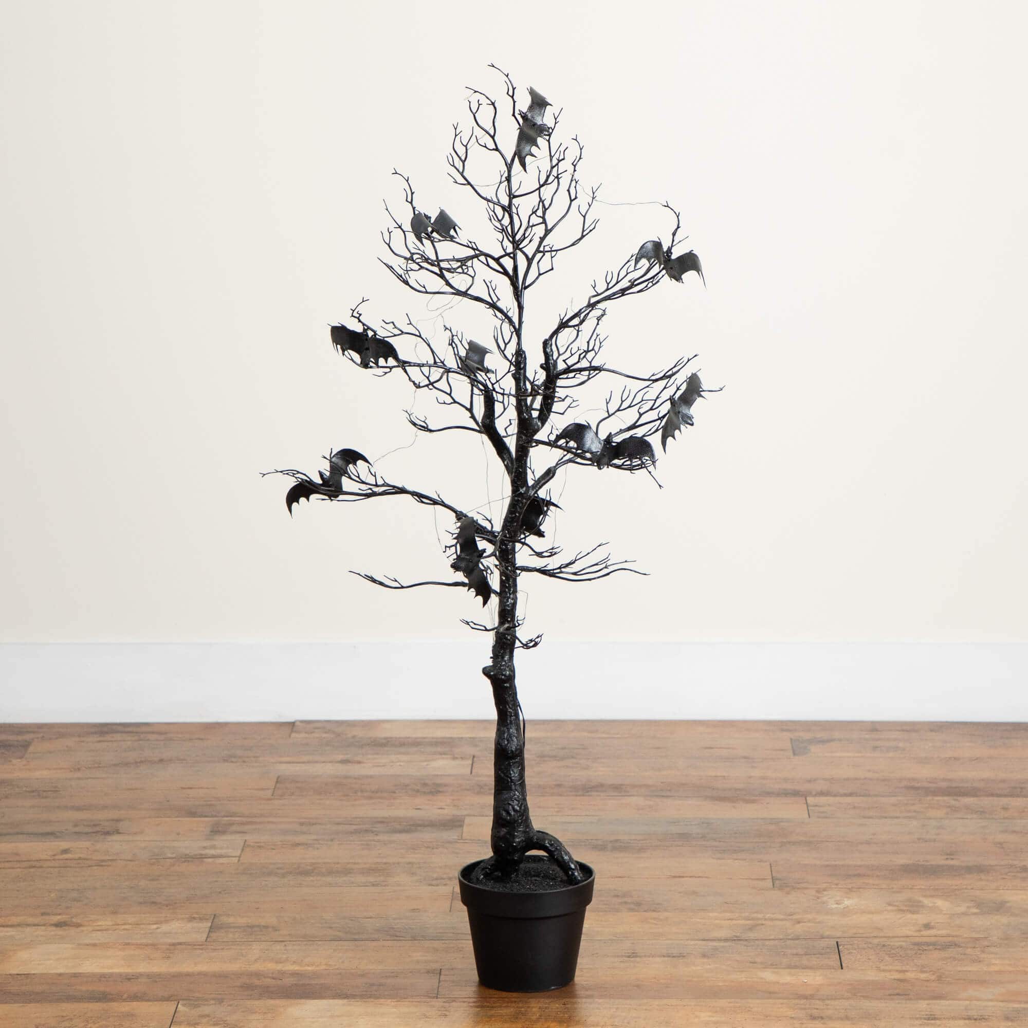 4ft. Pre-Lit Artificial Halloween Black Spooky Twig Tree with Bats and 120 Orange &#x26; Purple LED Lights