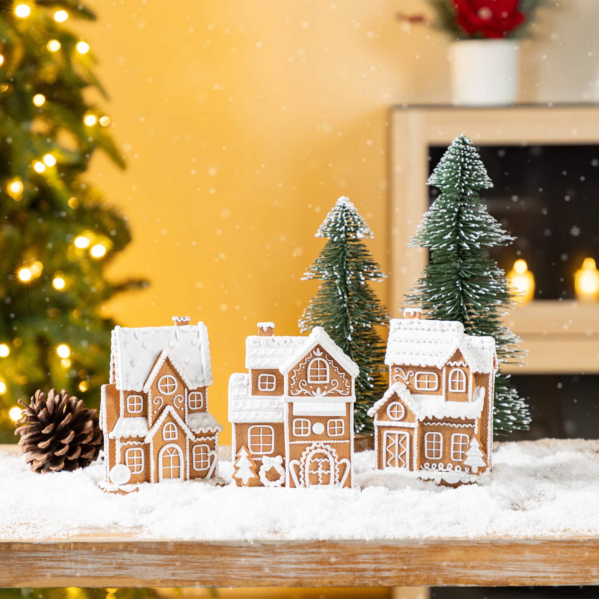 Glitzhome&#xAE; 5.5&#x22; Christmas Resin Gingerbread House Table Decor Set