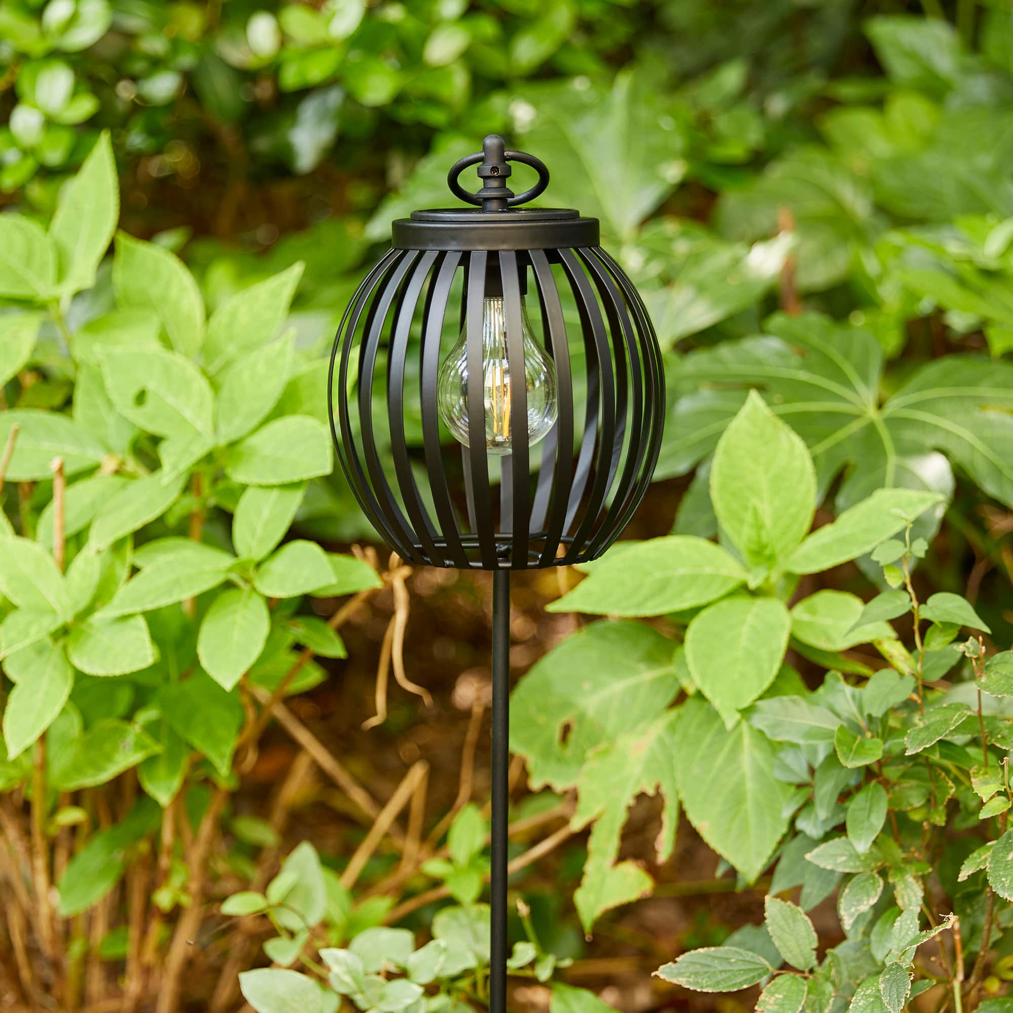 Glitzhome&#xAE; 32.25&#x22; Black Metal Stripes Solar Powered Outdoor Lantern