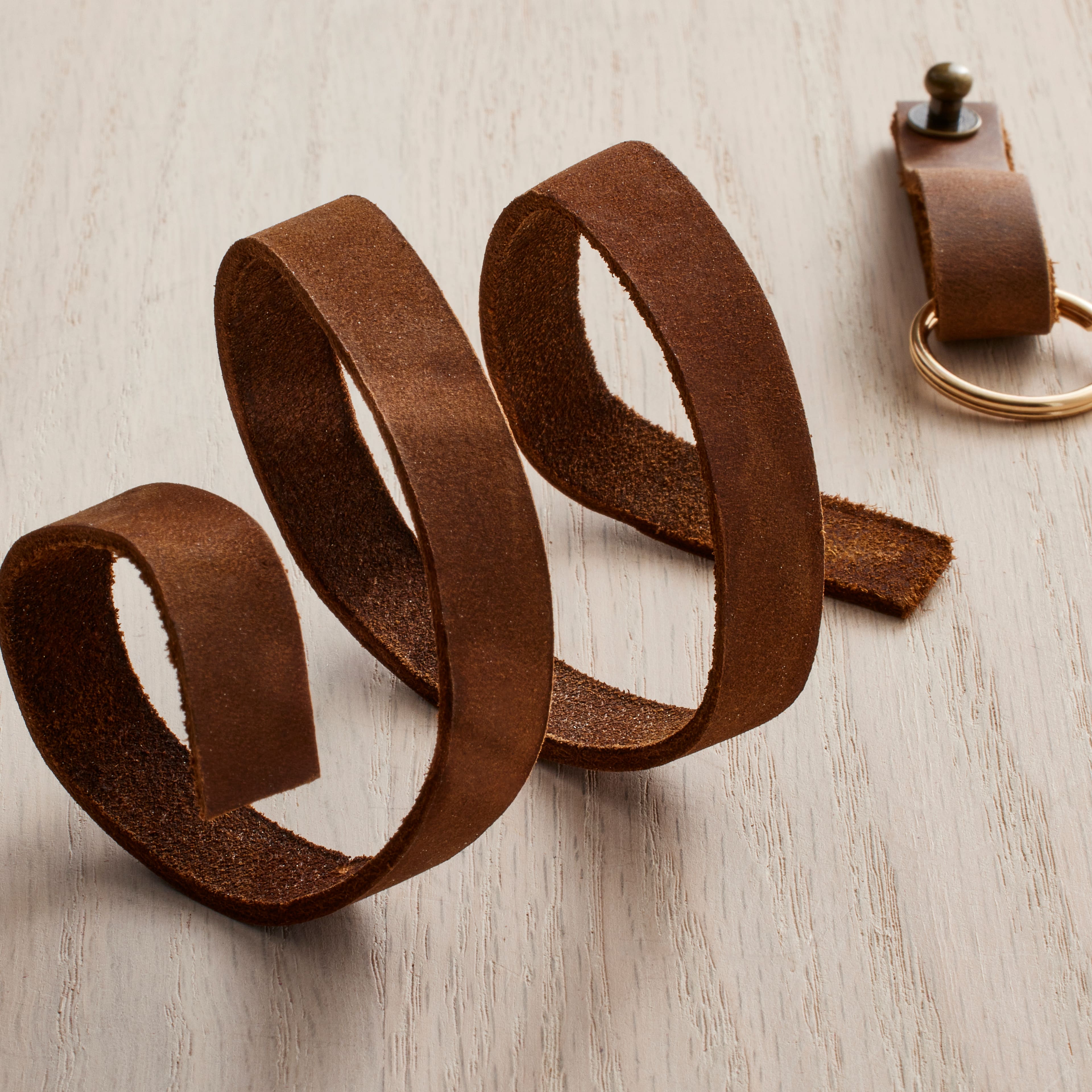 12 Pack: Triumph Brown Leather Strip by Bead Landing™