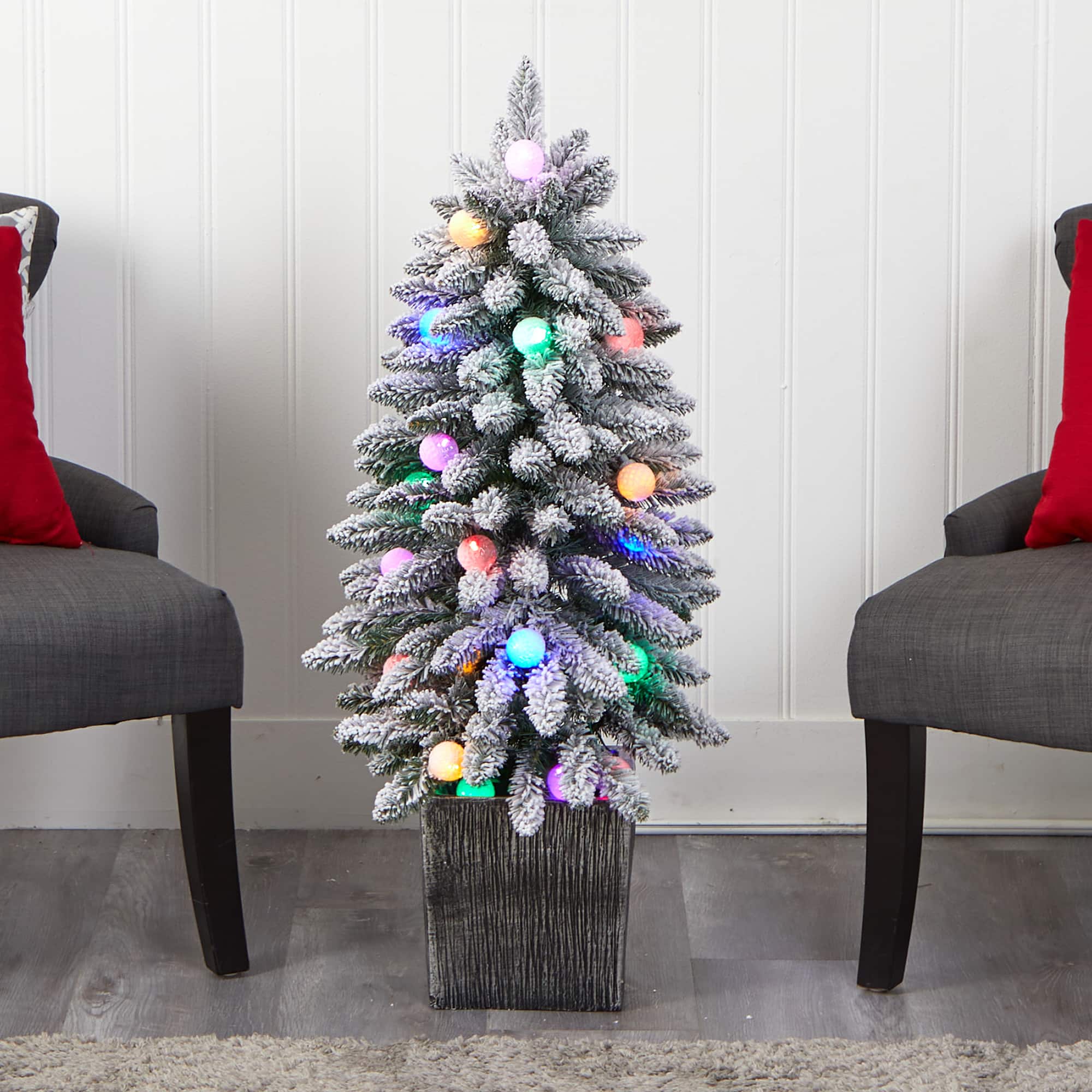 3ft. Pre-Lit Flocked Highland Fir Artificial Christmas Tree in Decorative Planter, Multicolor 20 LED Lights