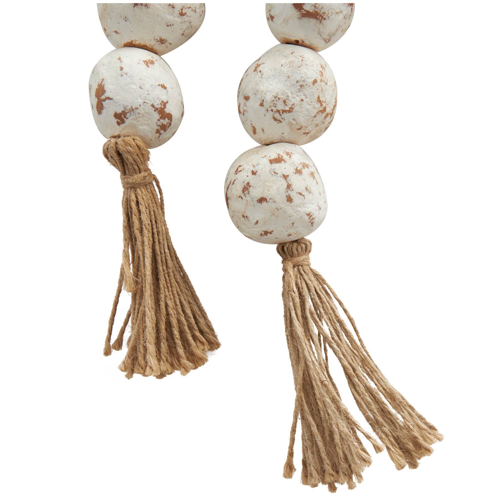 5ft. Paper Mache Round Distressed Beaded Garland with Tassel