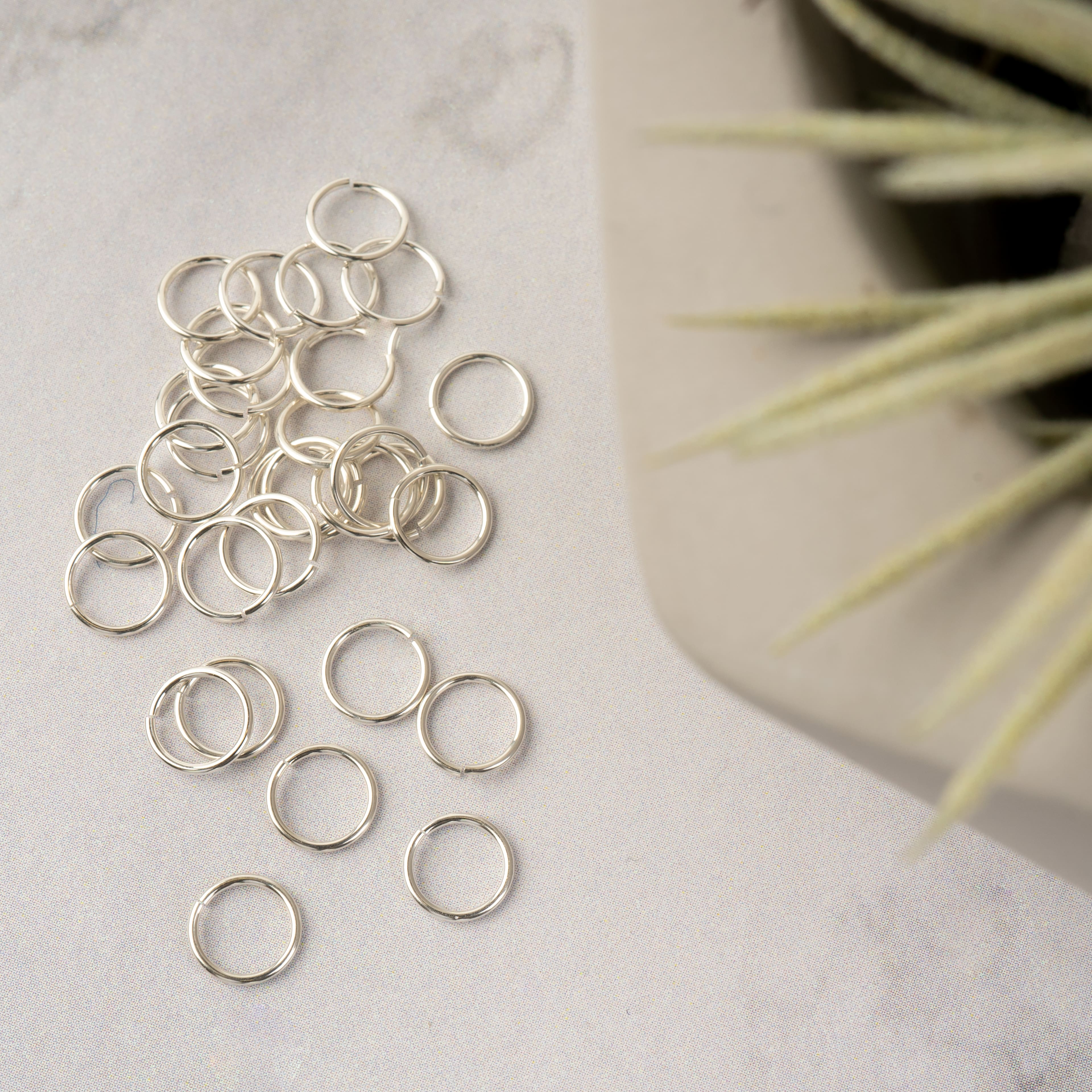 12 Packs: 30 ct. (360 total) Sterling Silver Jump Rings by Bead Landing™