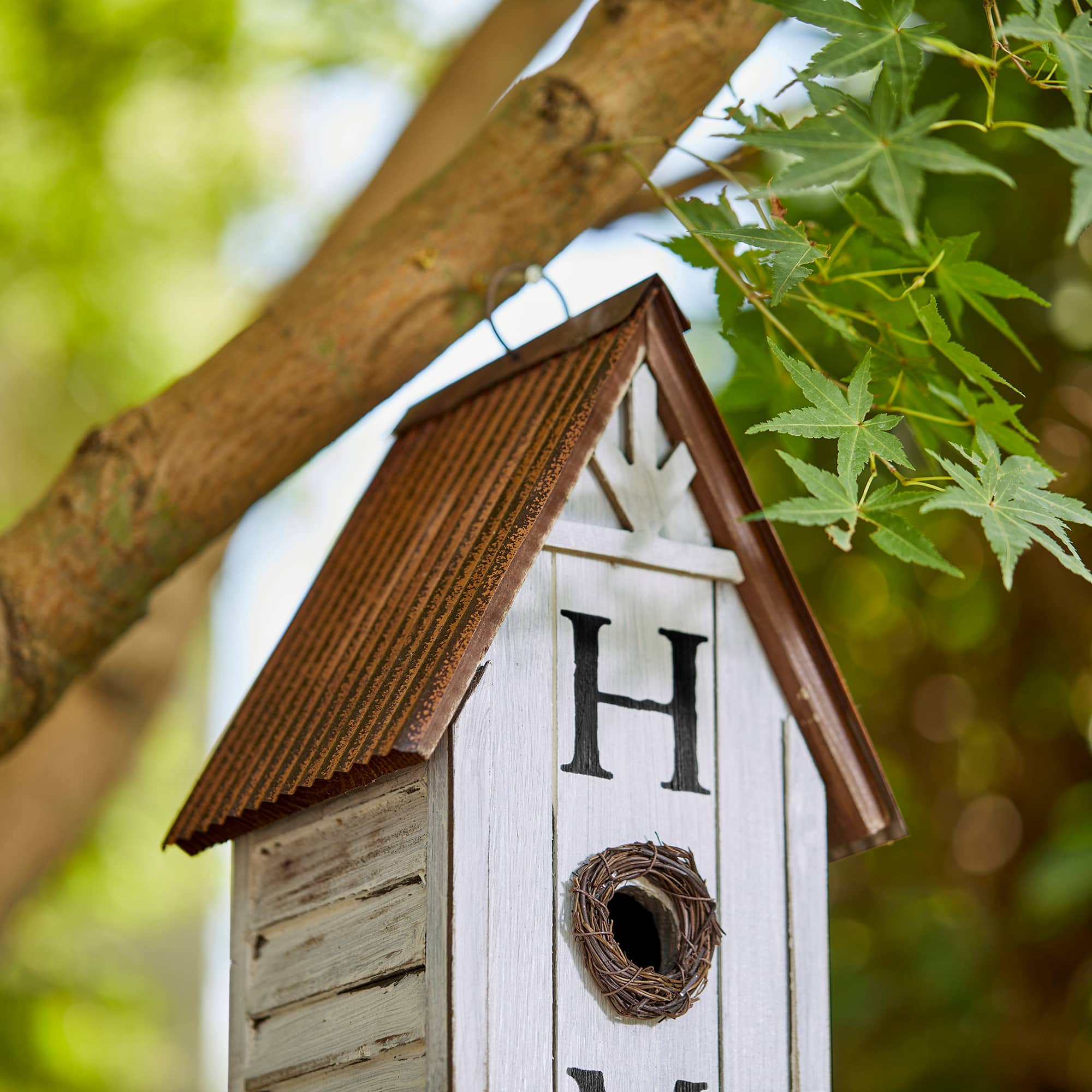 Glitzhome® 14.75" Distressed Wood HOME Birdhouse