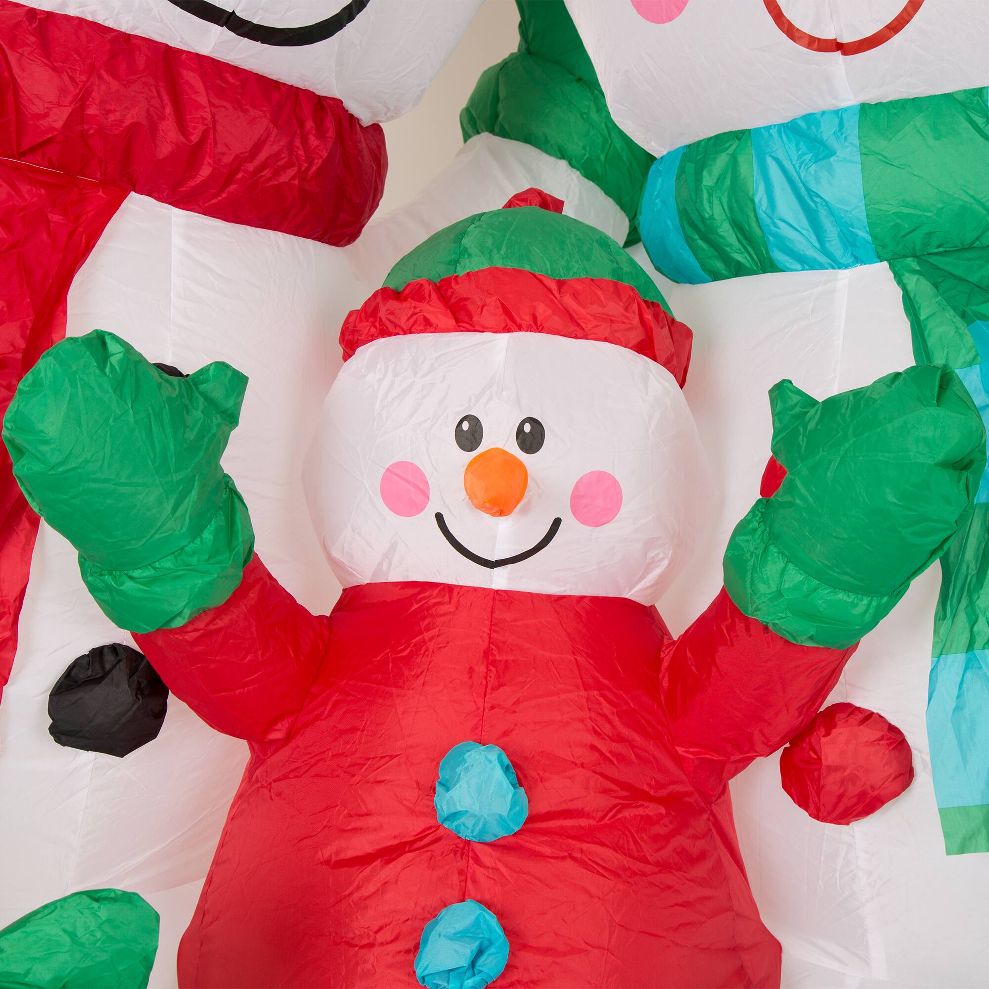 8ft. Glitzhome&#xAE; Inflatable Snowman Family with Lights
