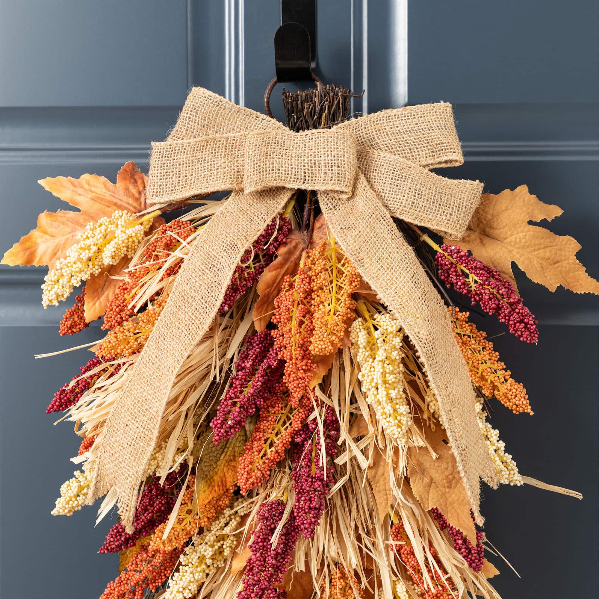 Glitzhome® 28" Fall Sorghum Swag Includes a Black Metal Wreath Hanger