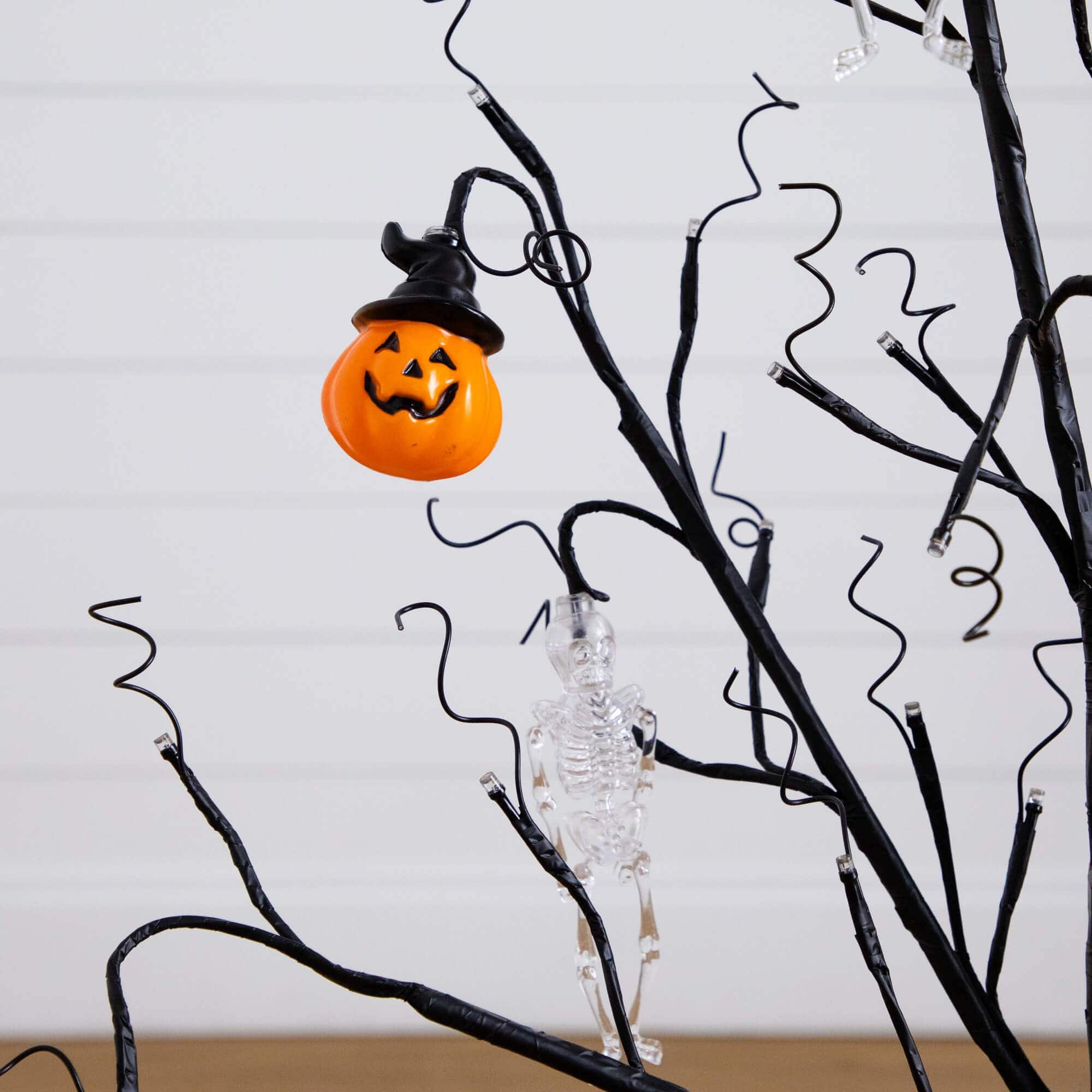 3ft. Pre-Lit Artificial Halloween Pumpkins and Skulls Ornament Tree with 48 Warm White LED Lights