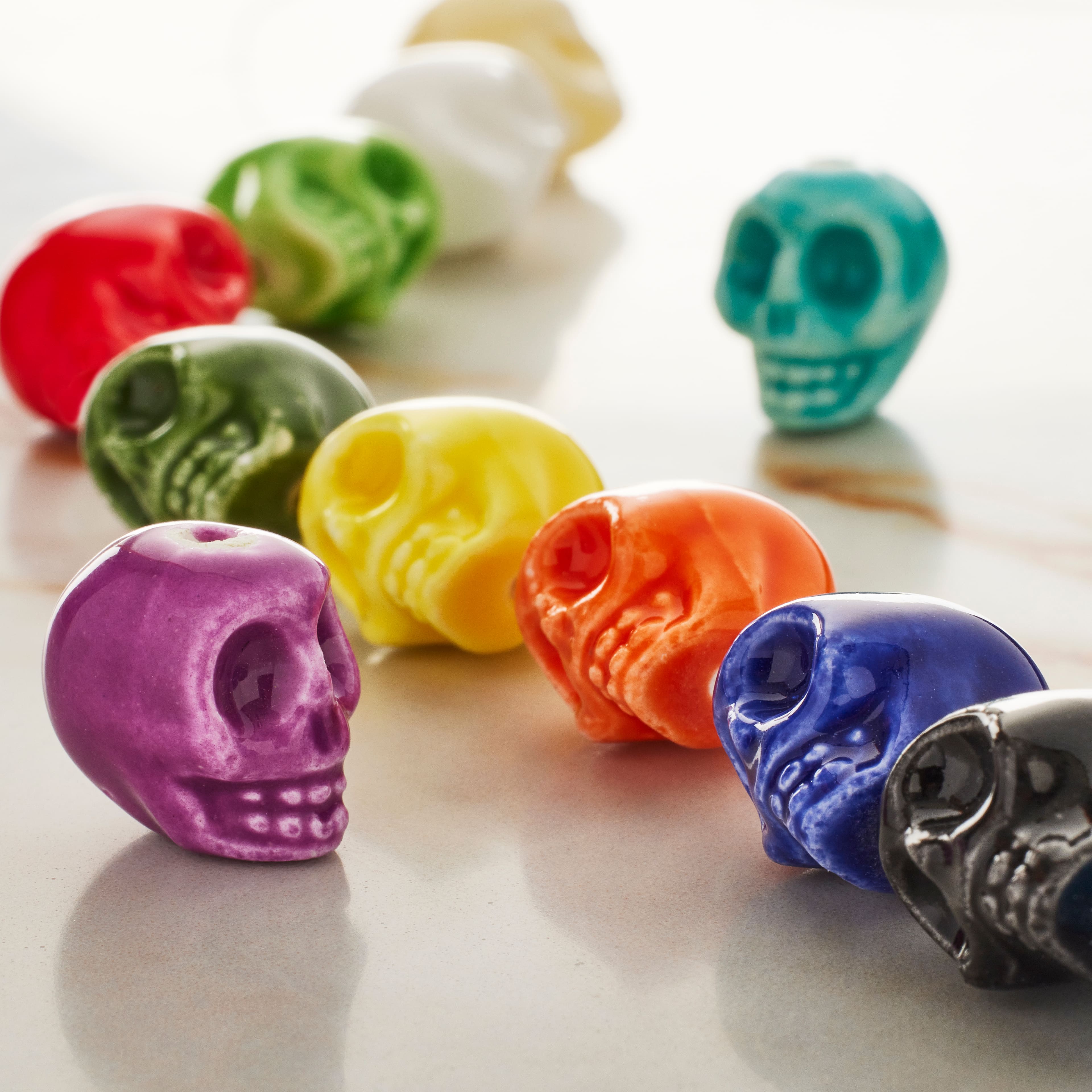 12 Pack: Colorful Ceramic Skull Beads, 11mm by Bead Landing™