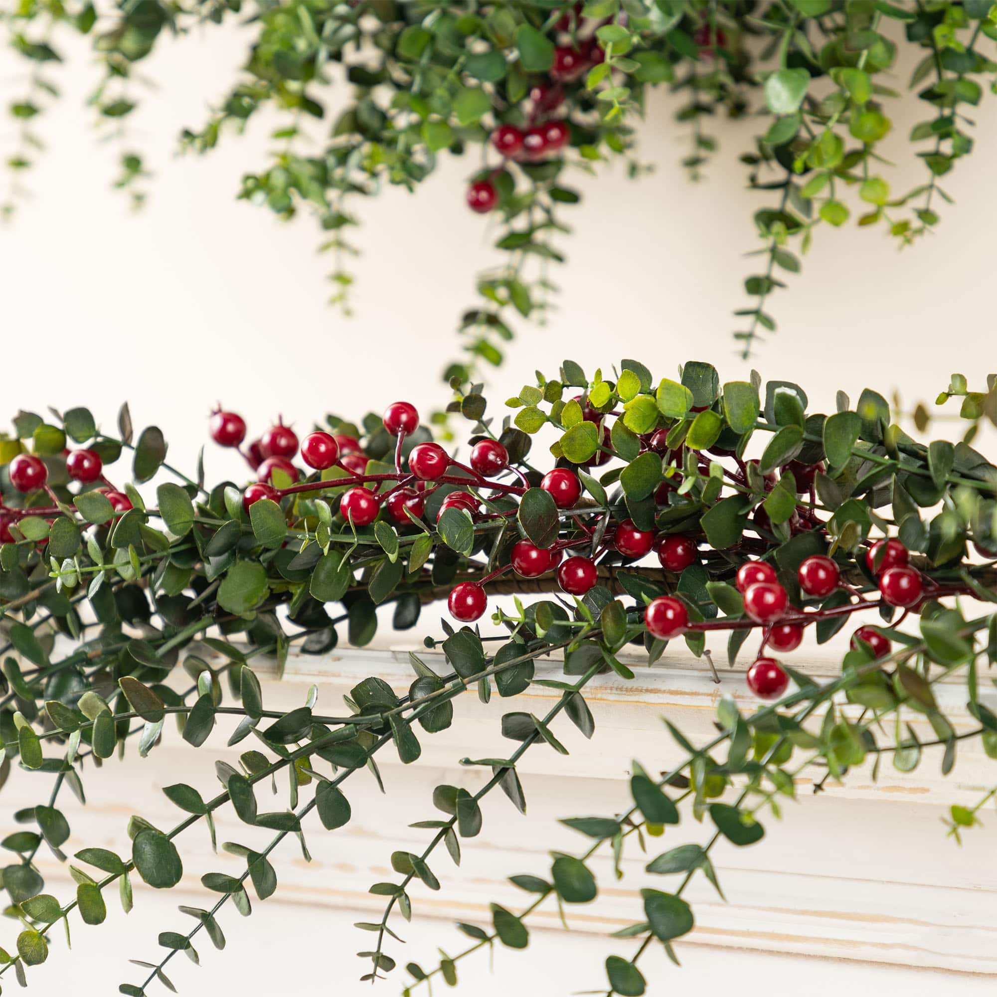 Glitzhome&#xAE; 9ft Christmas Greenery Eucalyptus Garland with Red Berries