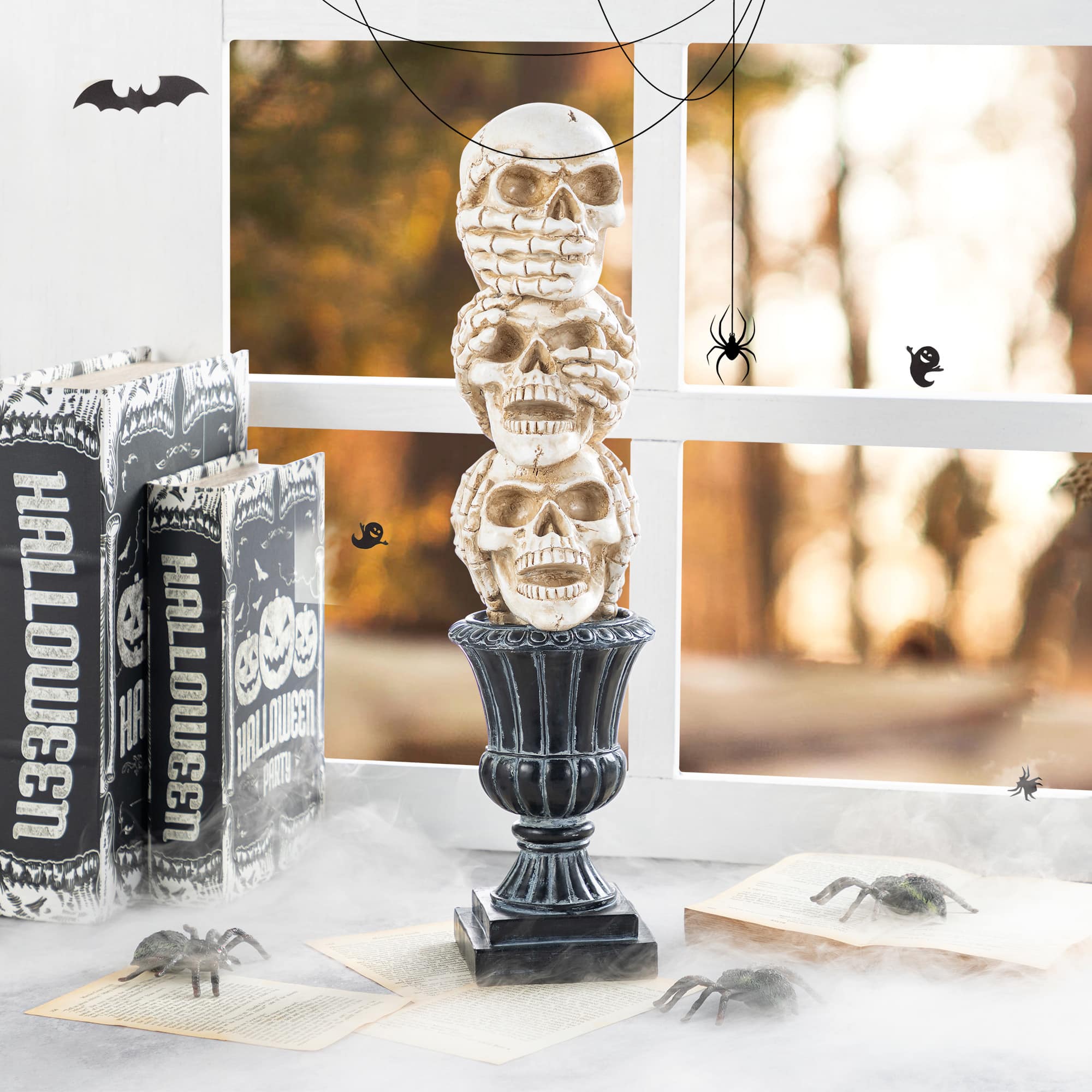 Glitzhome&#xAE; 18&#x22;H Halloween Resin Stacked Skull Table Decor