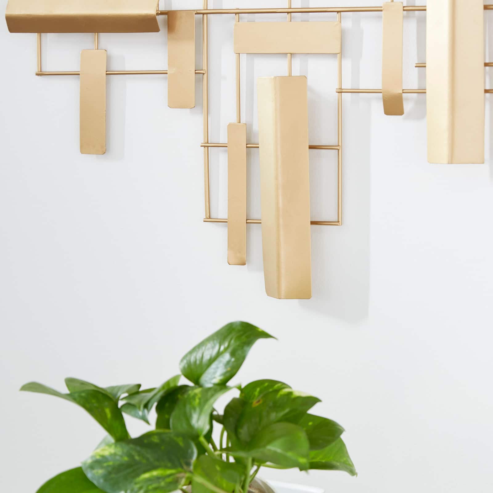 CosmoLiving by Cosmopolitan Gold Iron Grid Wall Accent