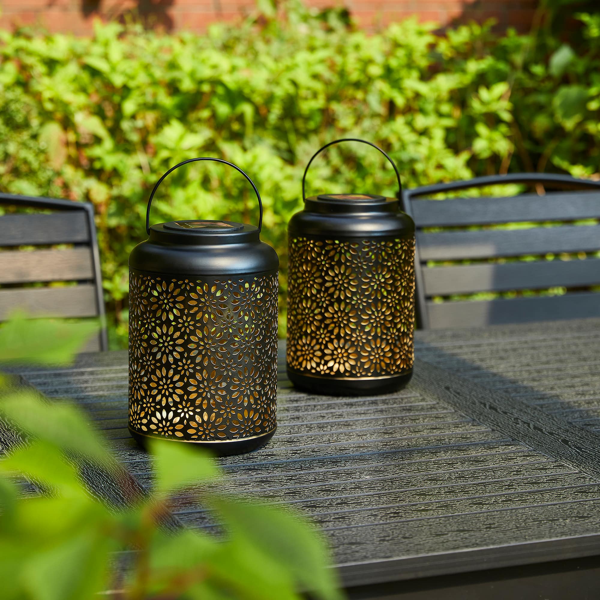 Glitzhome® 8.5" Flower Cutout Solar Powered Hanging Lantern