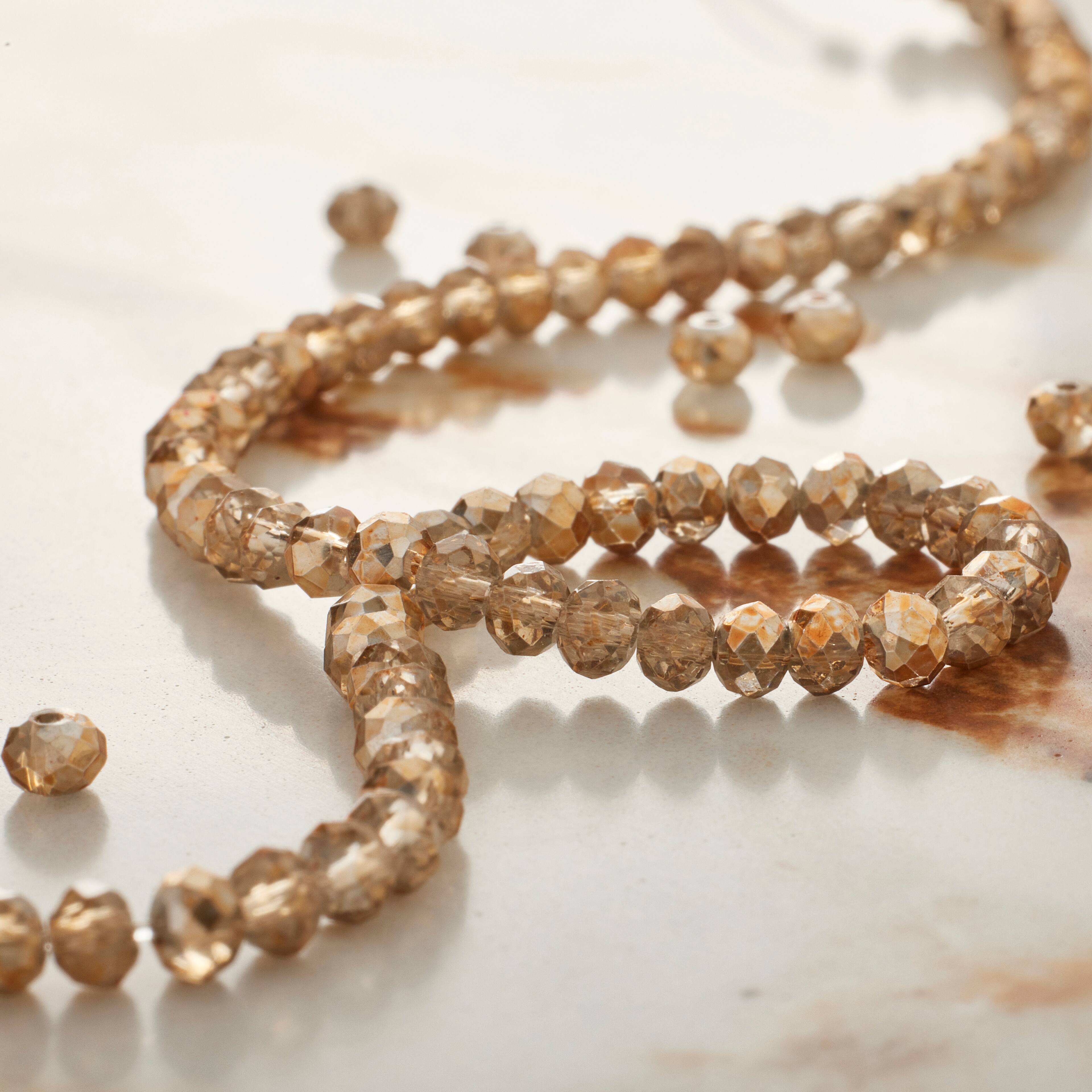 9 Pack: Amber Small Glass Faceted Rondel Beads, 3mm by Bead Landing™