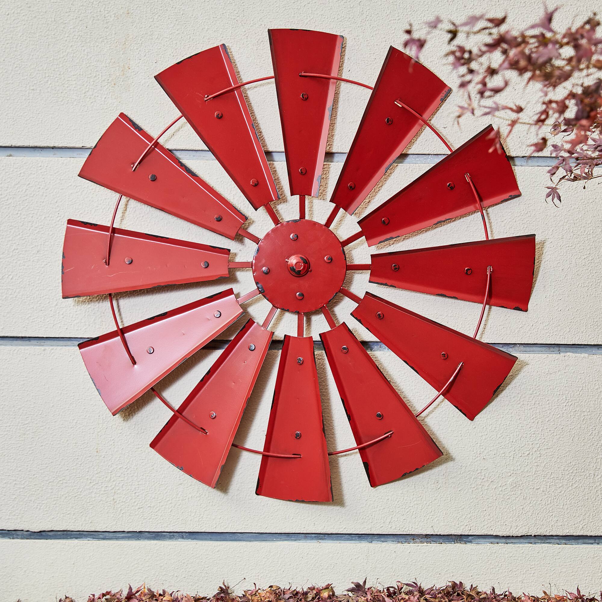 Glitzhome&#xAE; 28.5&#x22; Red Metal Wind Spinner Wall D&#xE9;cor