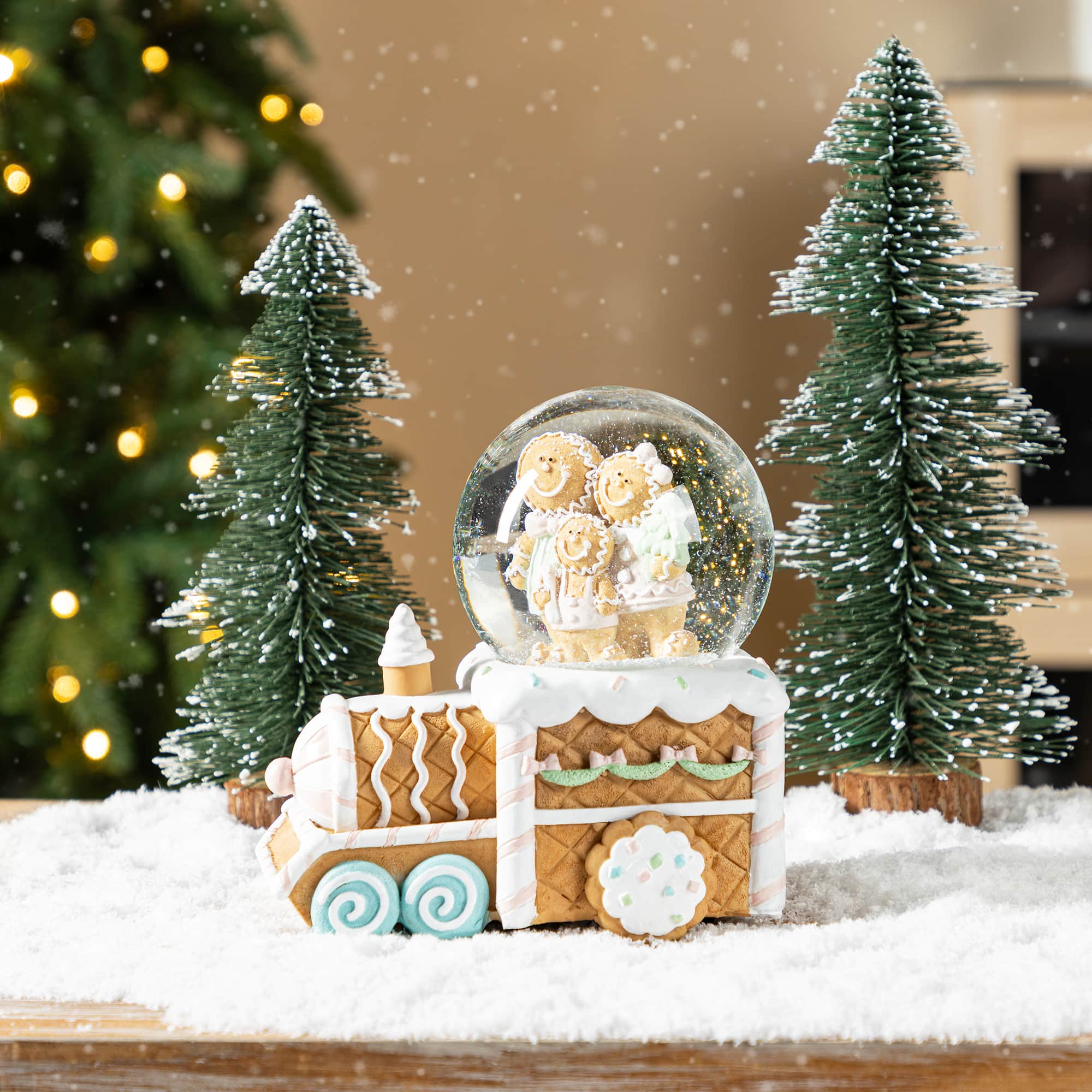 Glitzhome&#xAE; 100mm Christmas Resin Musical Snowflakes Ginginerbread Family Train Waterglobe