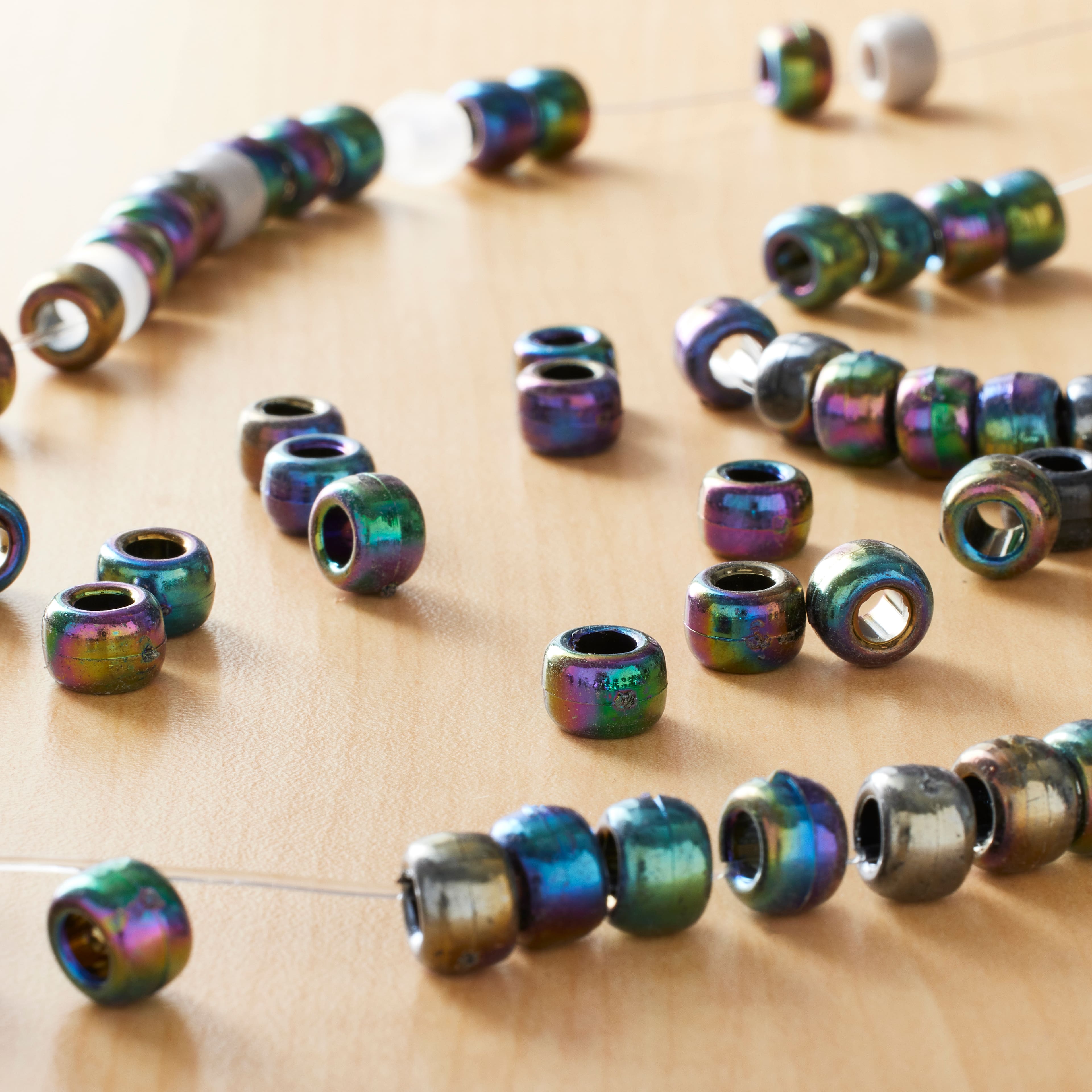 12 Packs: 280 ct. (3,360 total) Black Aurora Borealis Pony Beads by Creatology&#x2122;, 6mm x 9mm