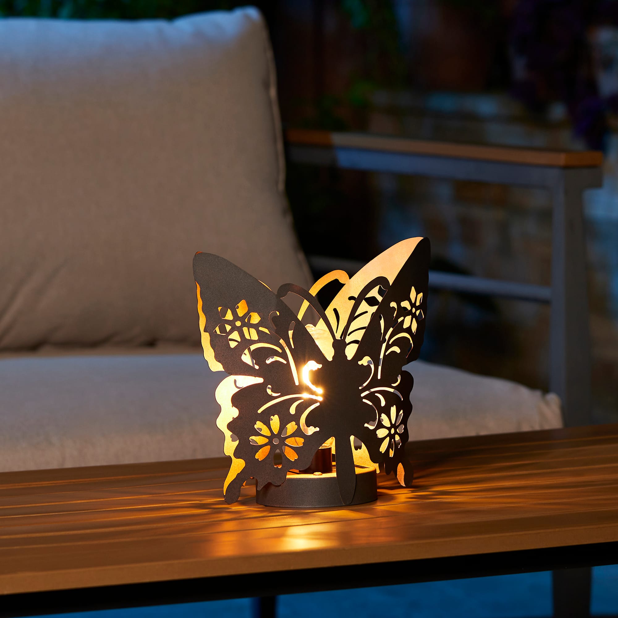 Glitzhome&#xAE; 9&#x22; Metal Flying Butterfly Silhouette Solar Powdered Edison Bulb Outdoor Lanterns, 2ct.