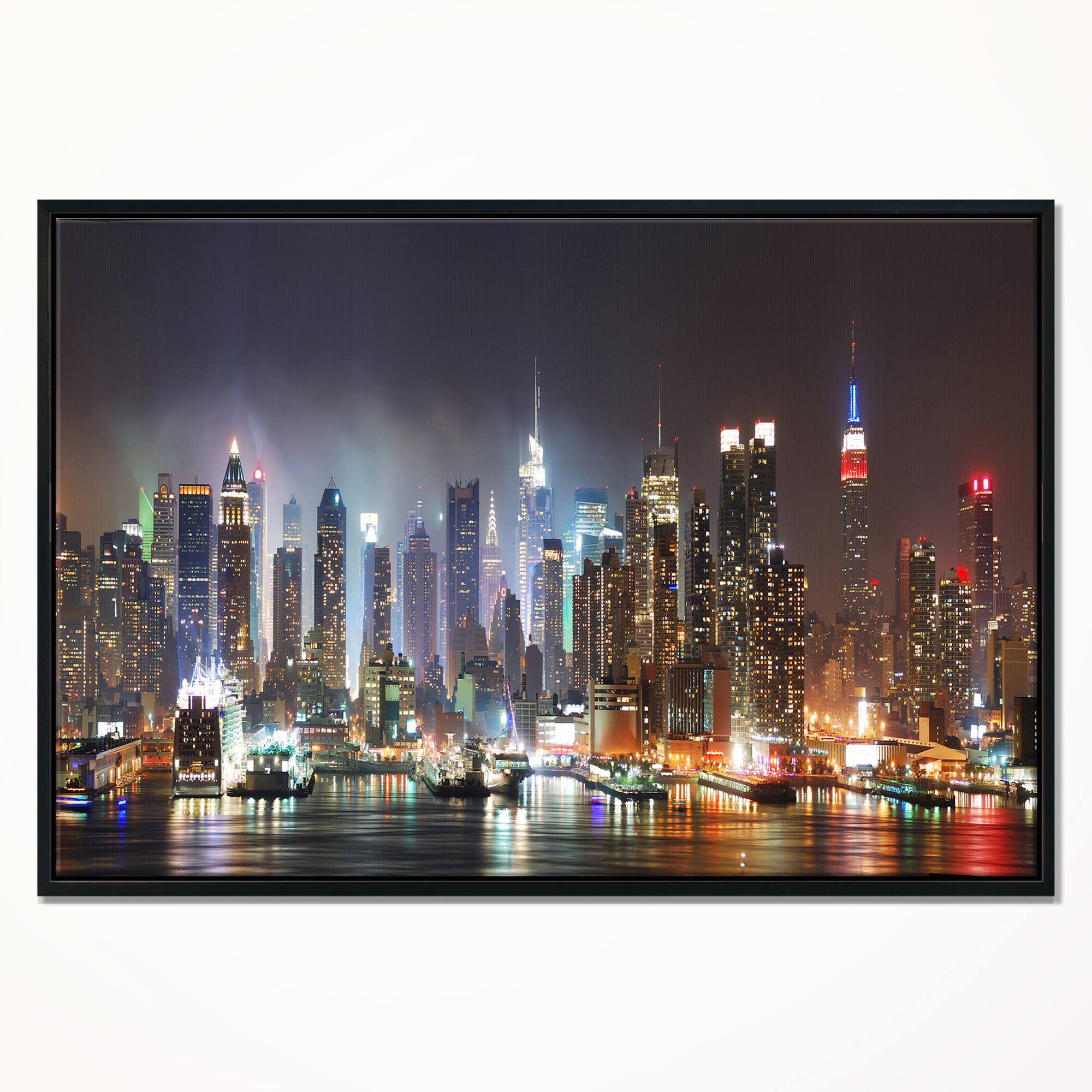 Designart - Lit NYC Manhattan Skyline - Cityscape Photo Framed Canvas Print