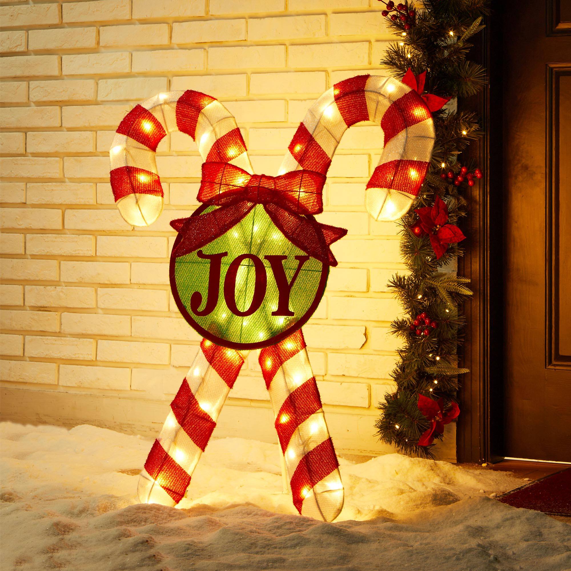 Glitzhome&#xAE; 3ft. Lighted Christmas Candy Cane Outdoor D&#xE9;cor