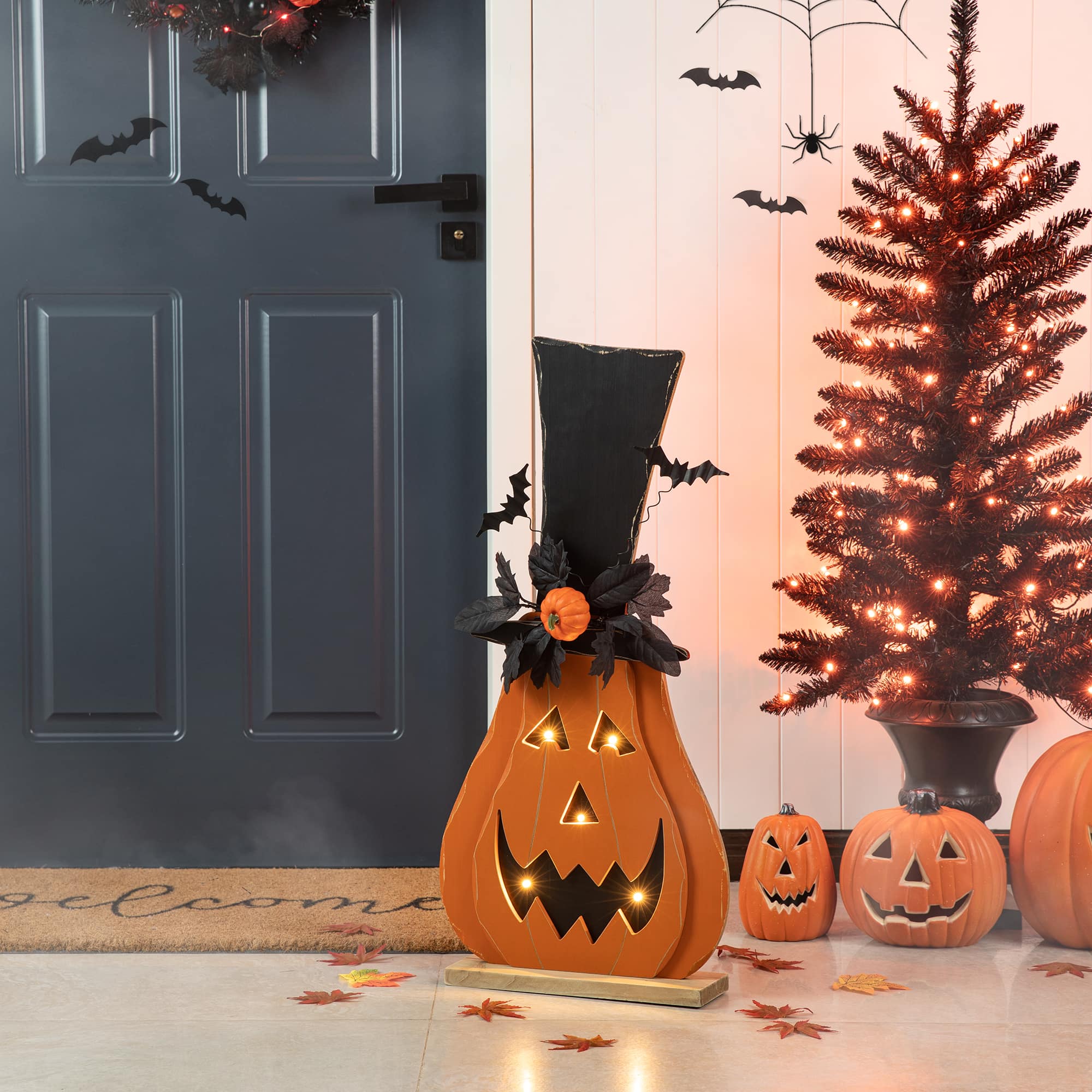 Glitzhome&#xAE; 30&#x22; Halloween Lighted Wood Floral Jack-O&#x27;-Lantern Porch D&#xE9;cor with Timer