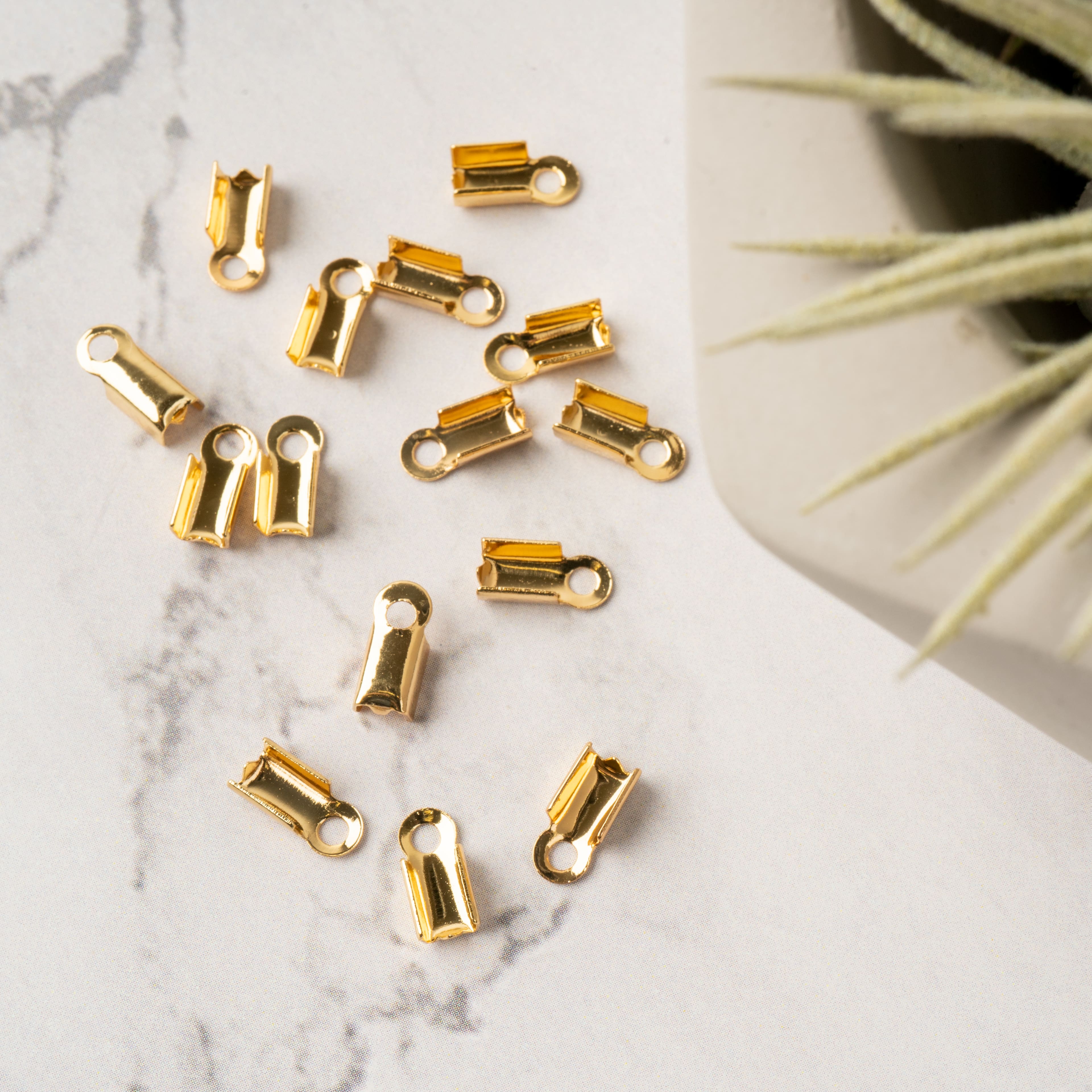 12 Packs: 15 ct. (180 total) 9mm 18K Gold-Plated Folding End Crimps by Bead Landing&#x2122;
