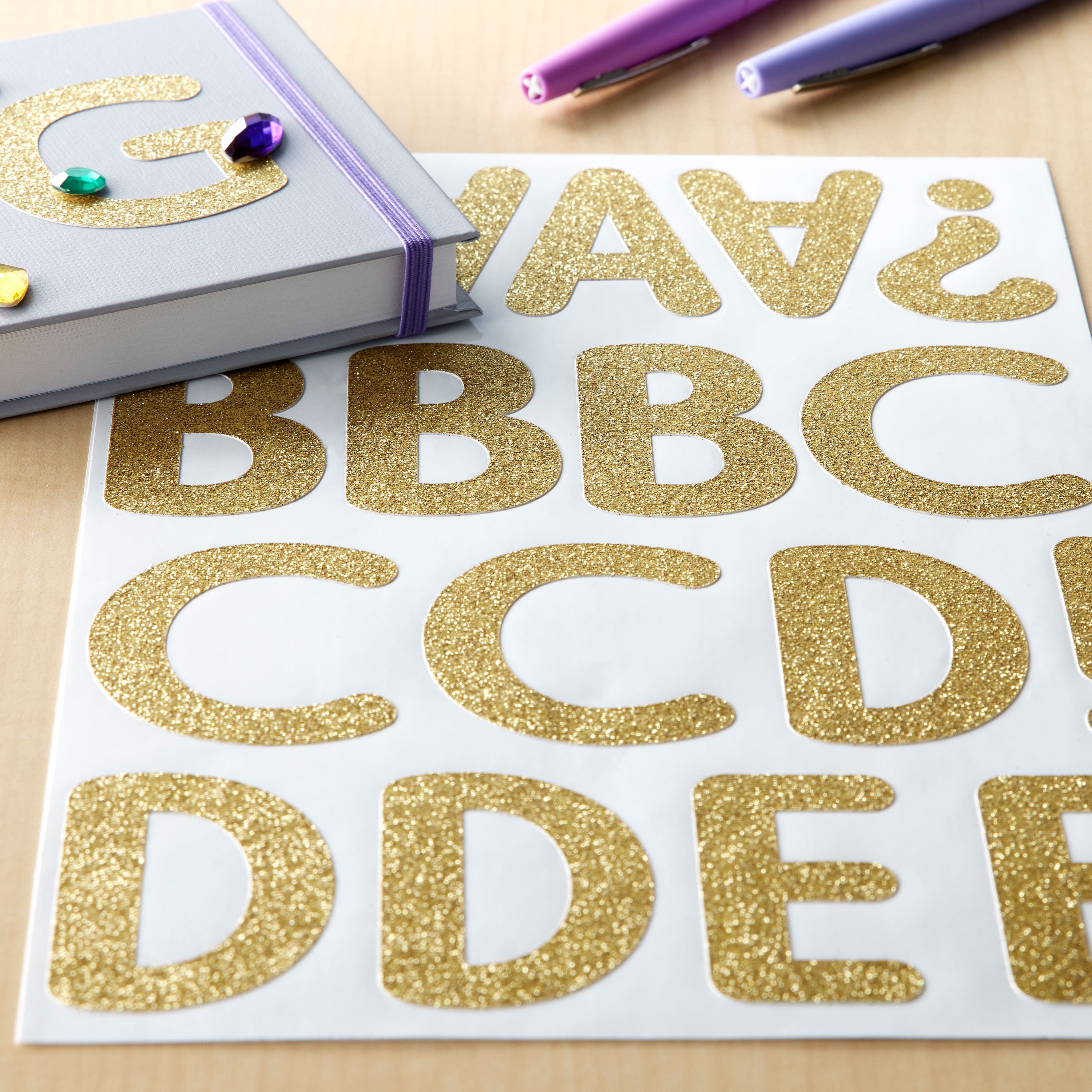 12 Pack: Gold Glitter Rounded Font Alphabet Stickers by Recollections™