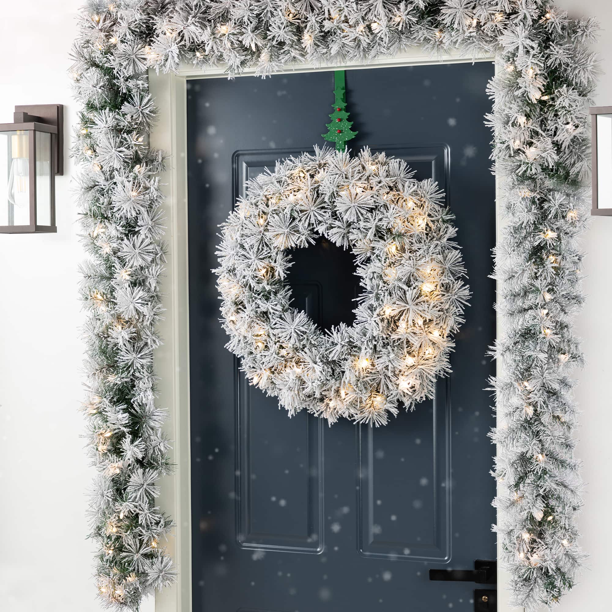 Glitzhome&#xAE; 9ft Pre-Lit Snow Flocked Greenery Pine Christmas Garland with Timer