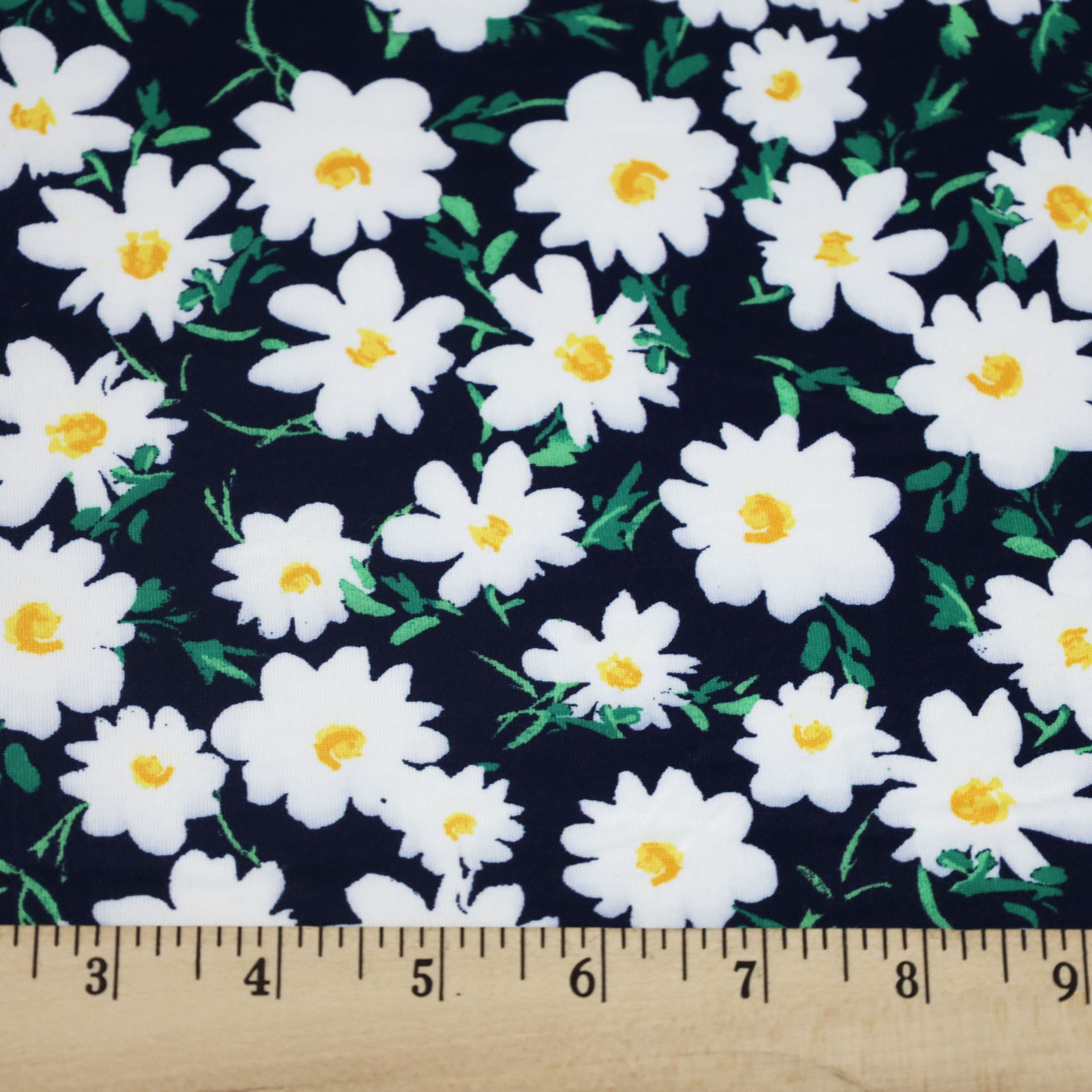 Fabric Merchants Daisies on Blue Double Brushed Stretch Fabric