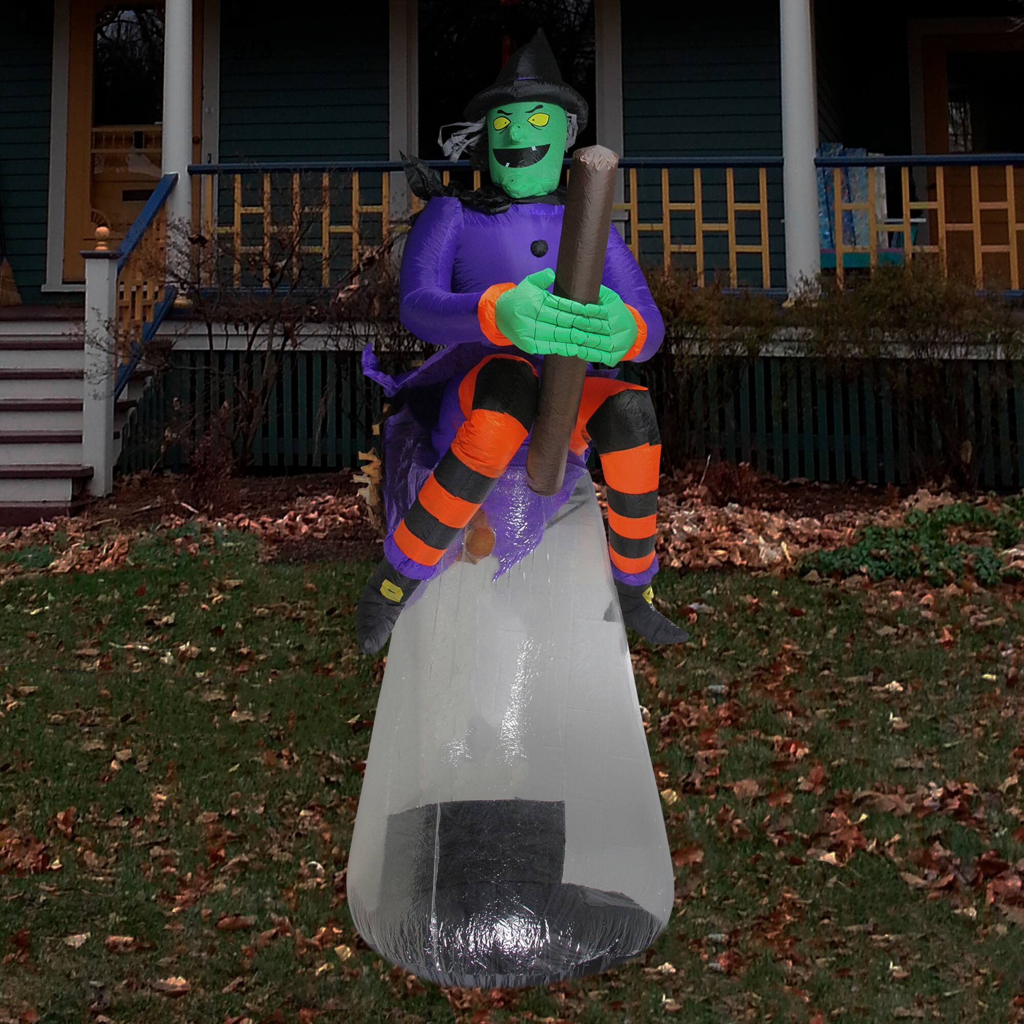 11ft. LED Lighted &#x26; Animated Inflatable Flying Witch Outdoor Halloween D&#xE9;cor