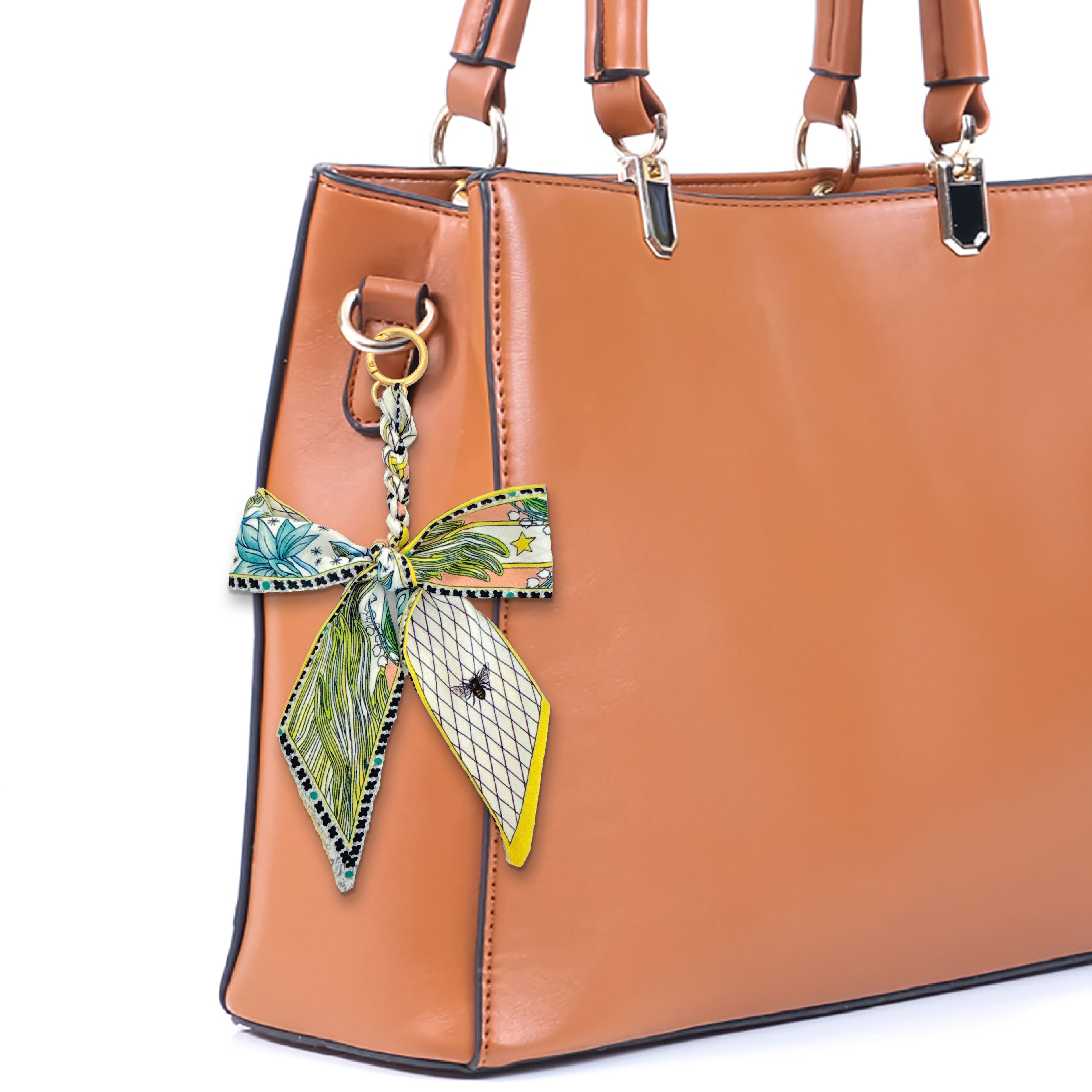 Blue Moon Studio&#x2122; Yellow &#x26; Multicolor Leaf Print Bow Bag Charm
