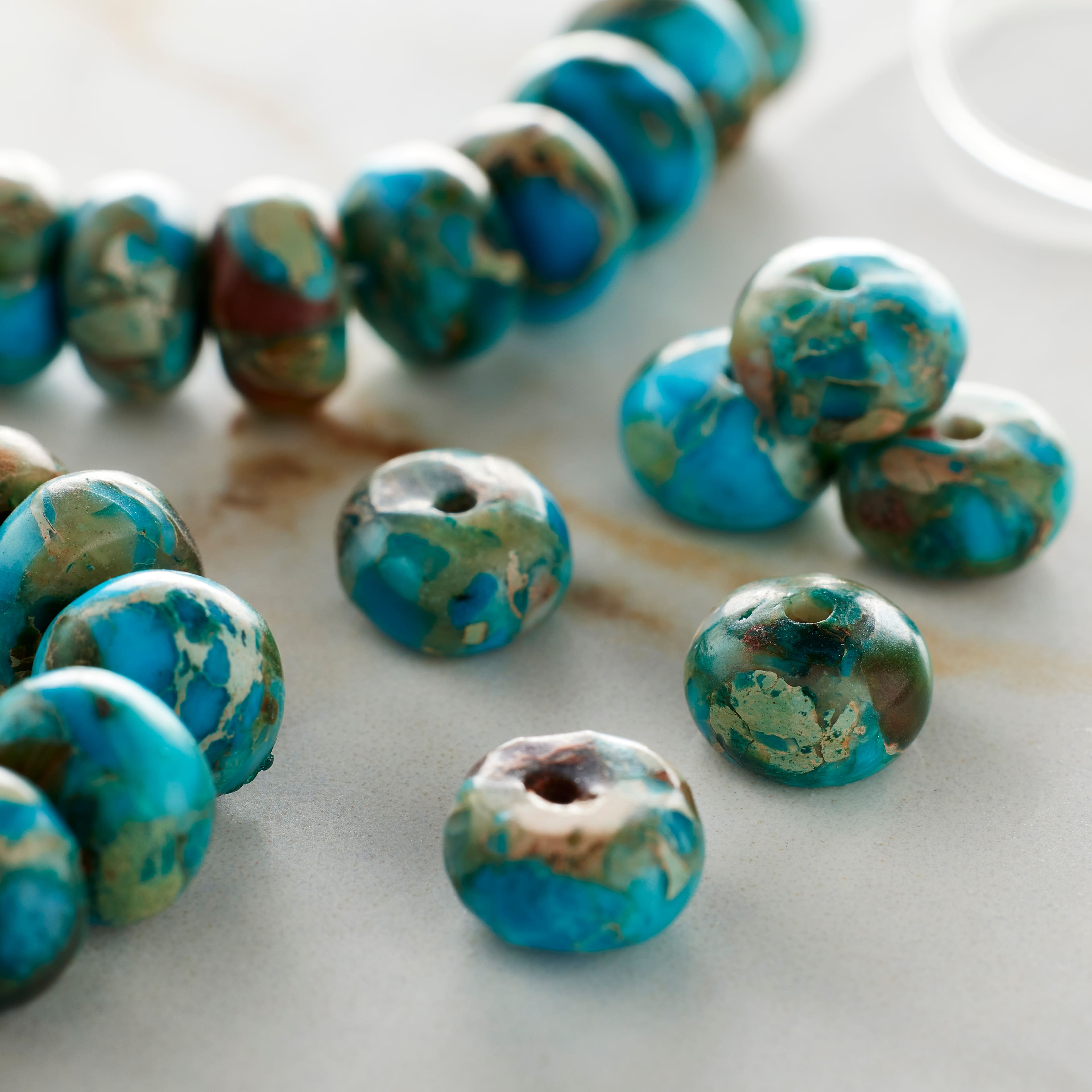 Bead Landing&#xAE; Aqua Serpentine Rondelle Beads, 8mm