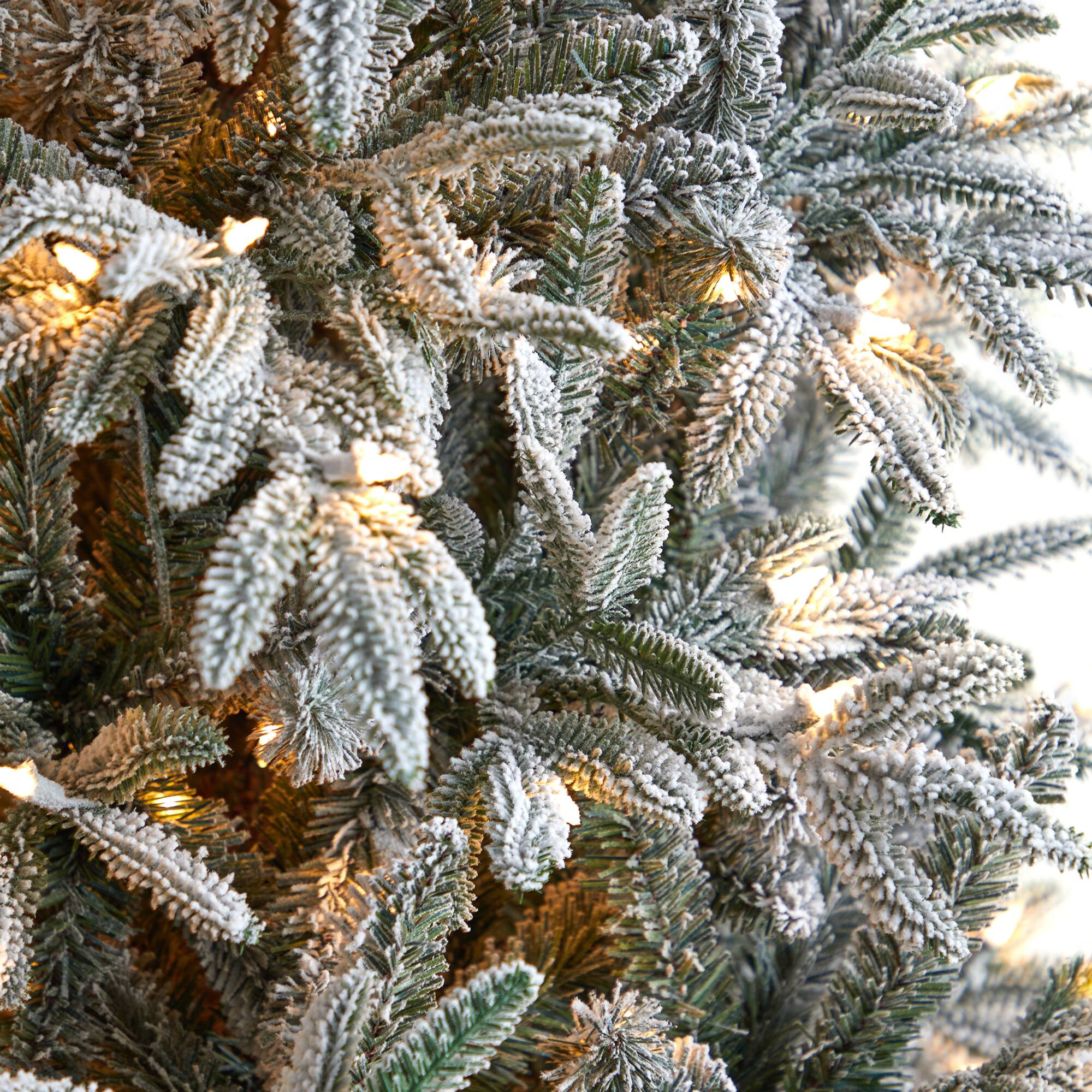 8.5ft. Pre-Lit Flocked Manchester Spruce Artificial Christmas Tree, Warm White Lights