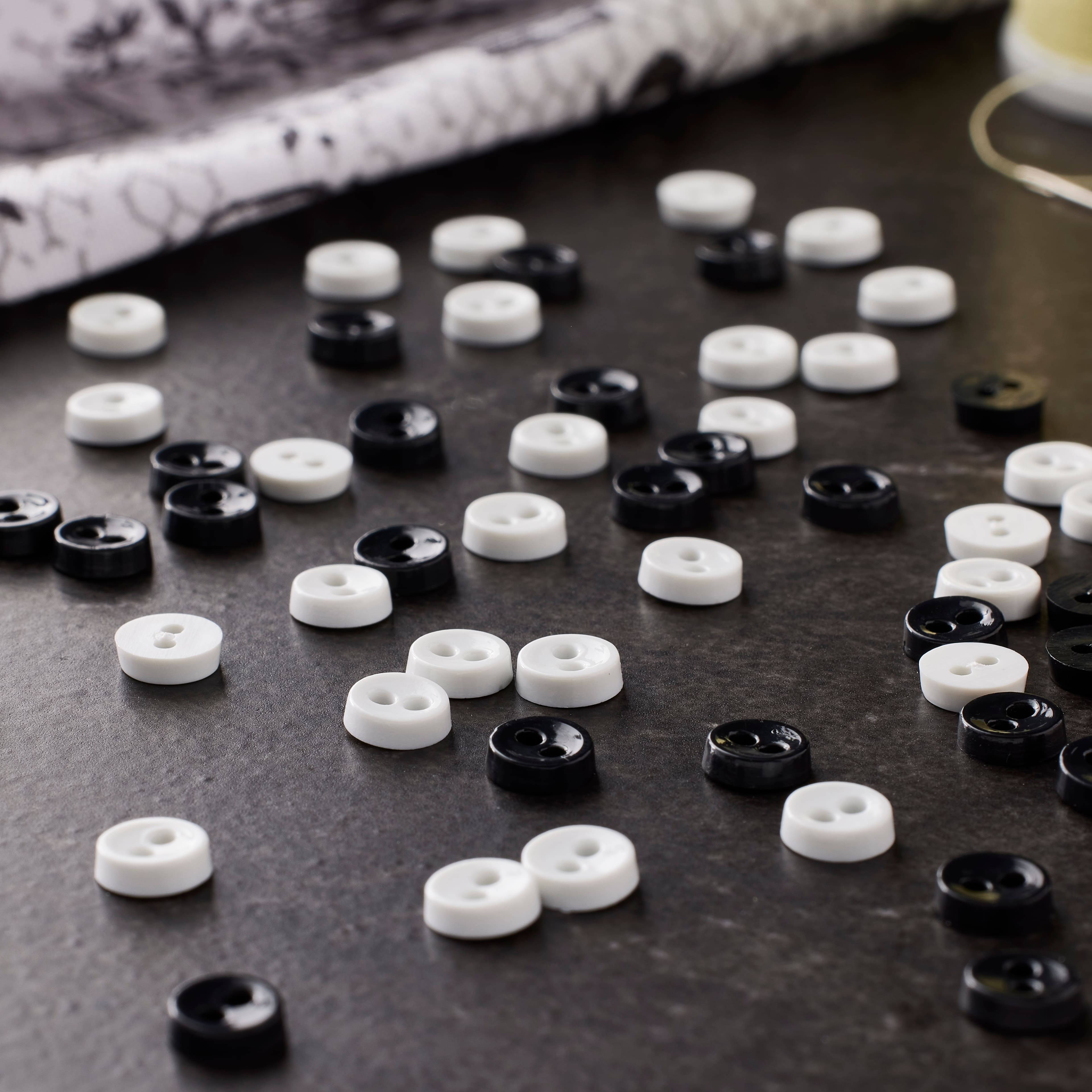 12 Packs: 75 ct. (900 total) Favorite Findings&#x2122; 1/4&#x22; Black &#x26; White Buttons