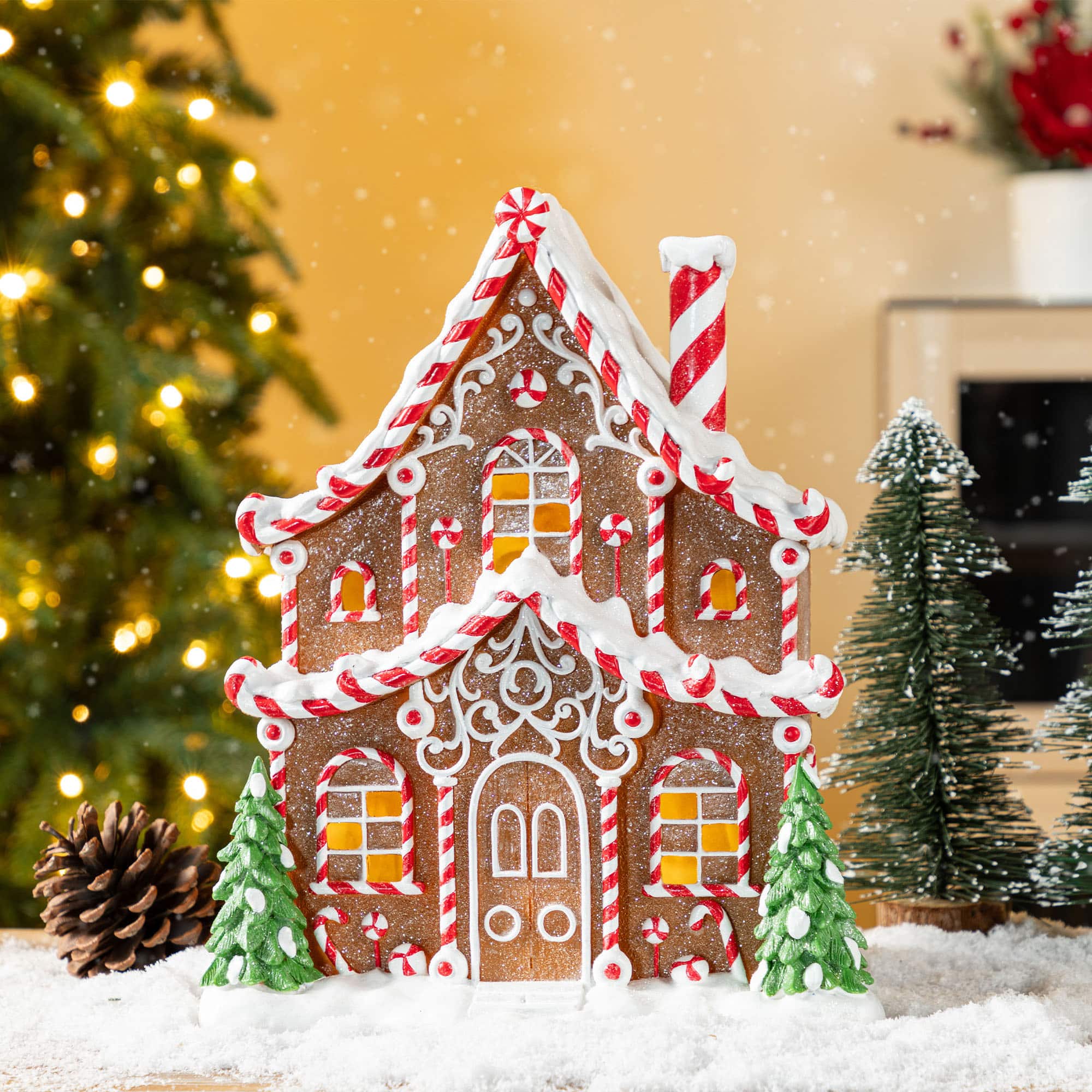 Glitzhome® 11.75" Christmas Lighted Resin Village Table Decor