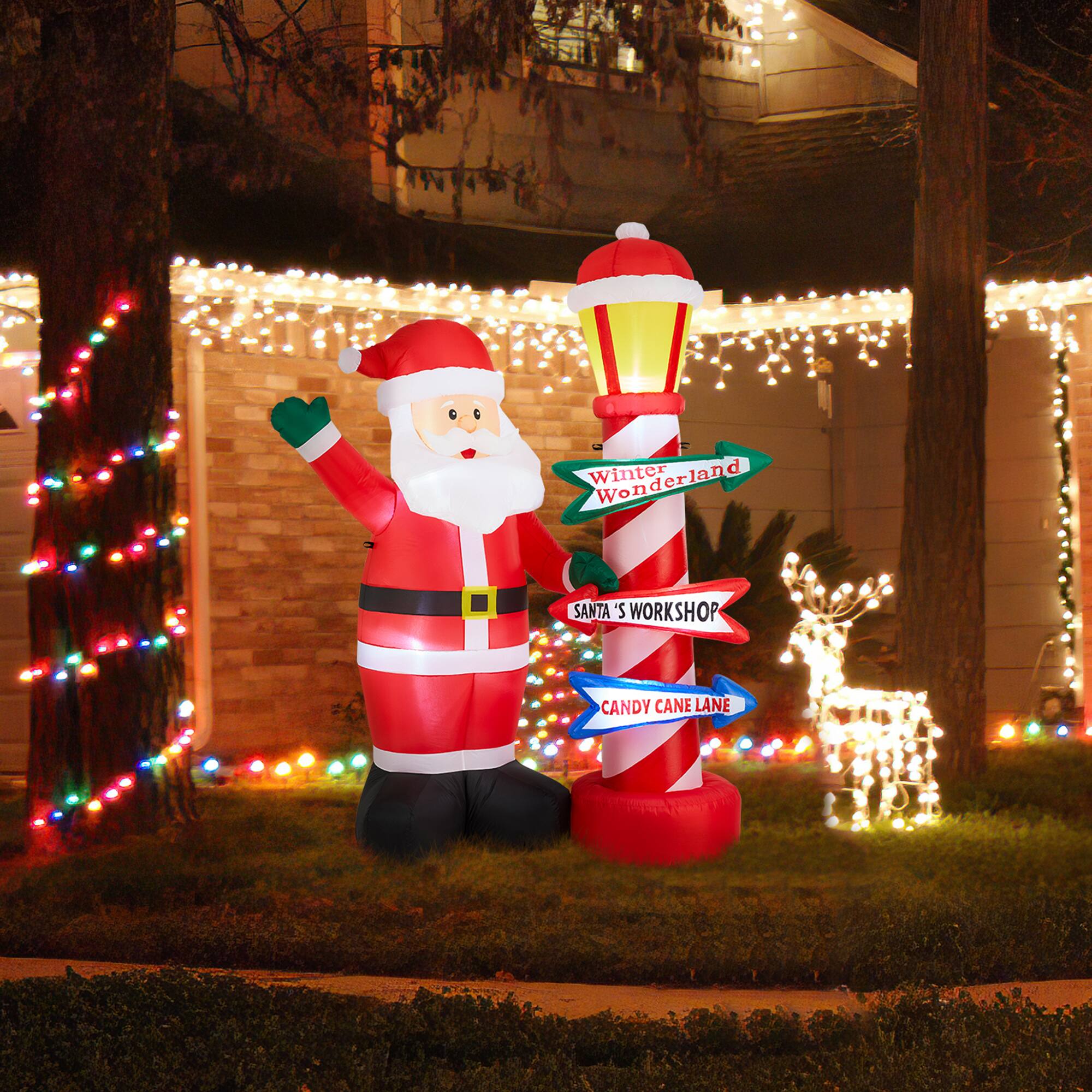 Glitzhome&#xAE; 7FT Lighted Inflatable Santa with Lamp Post Sign Decor