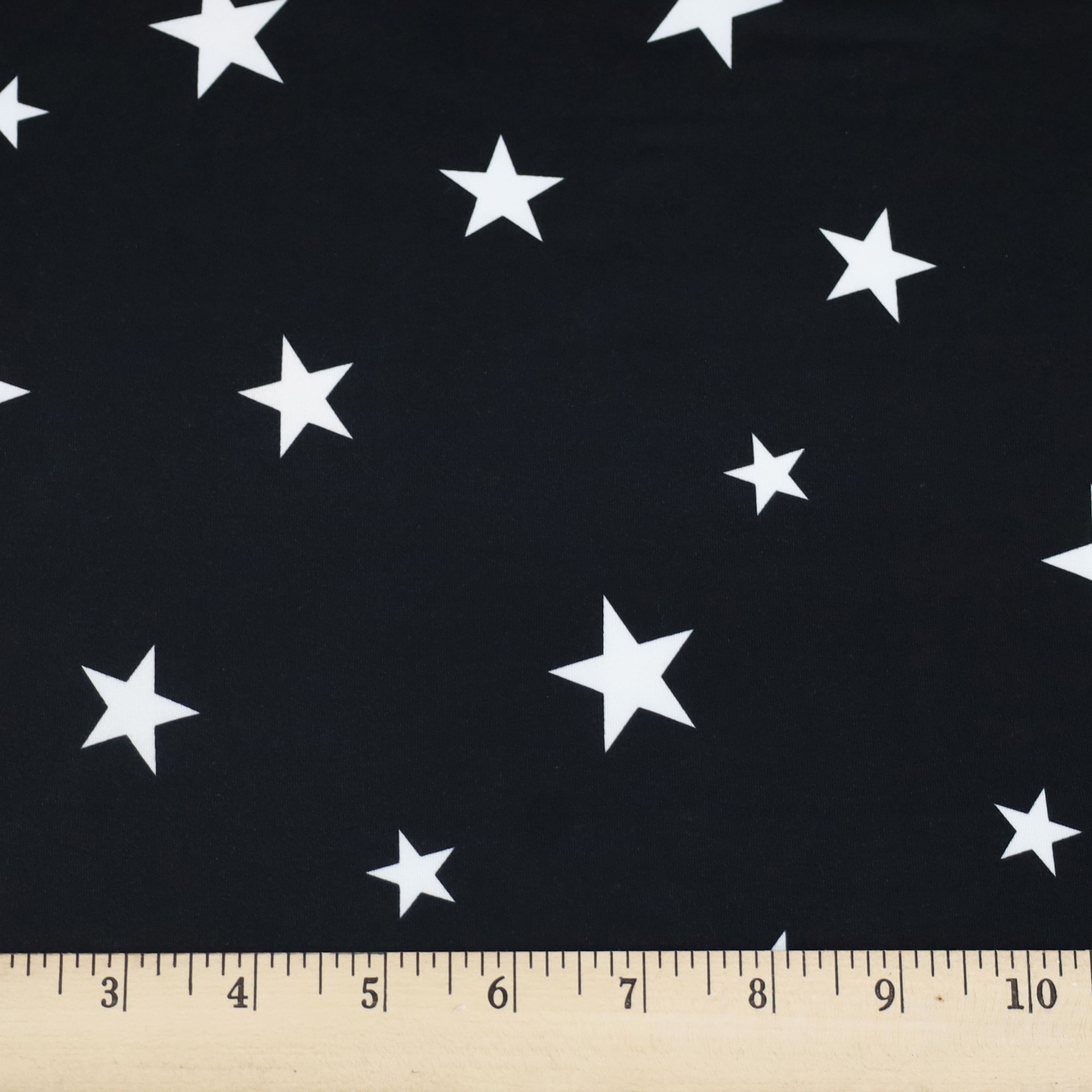 Fabric Merchants Stars on Black Double Brushed Stretch Fabric