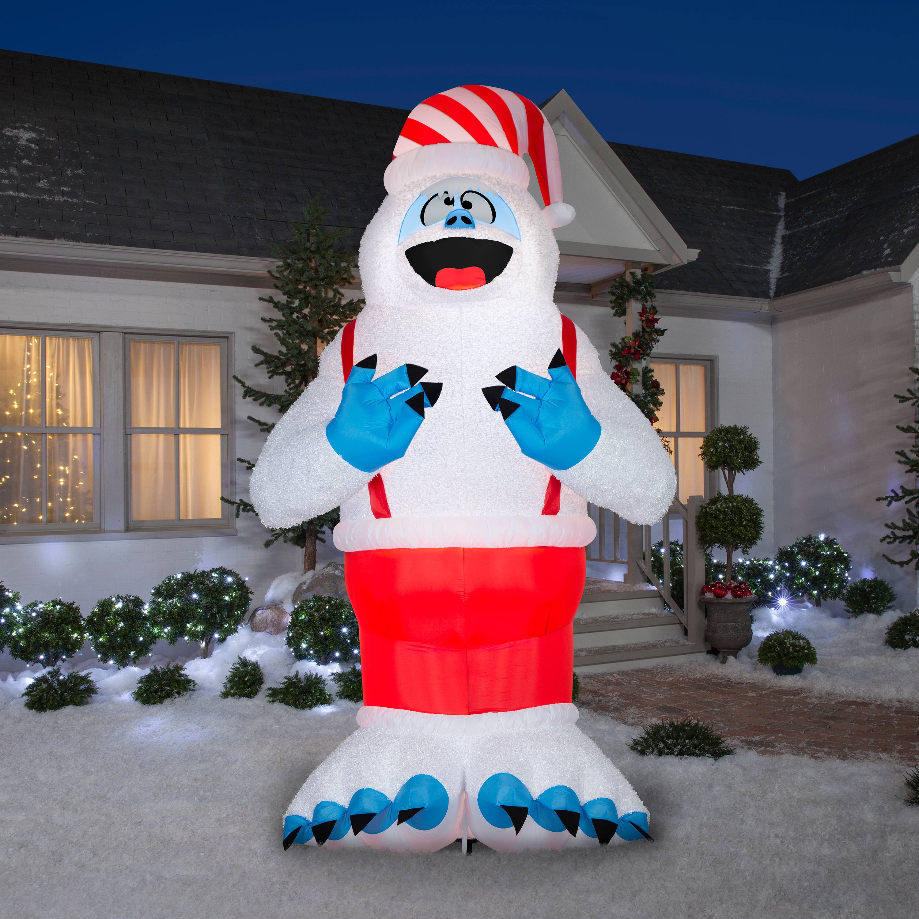 11ft. Airblown® Inflatable Giant Christmas Plush Bumble in Santa Hat & Suspenders