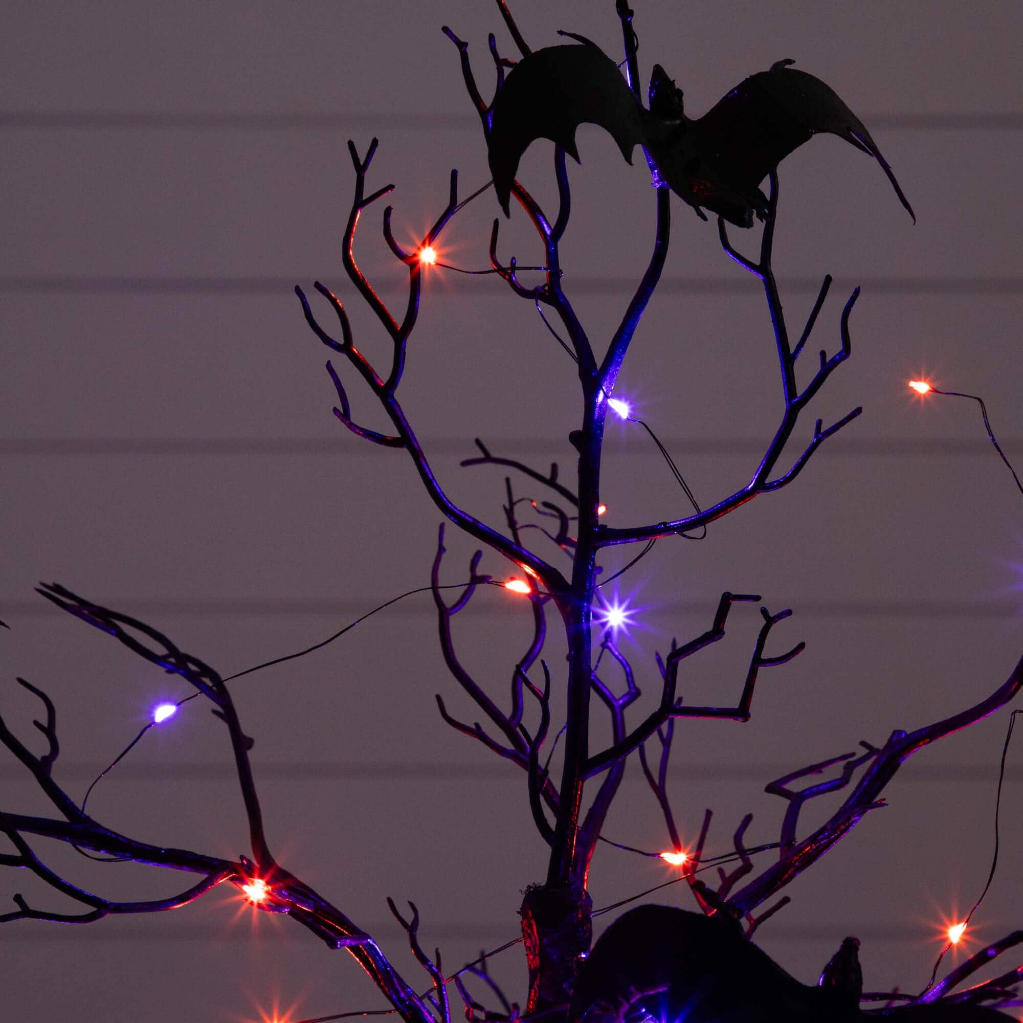 3ft. Pre-Lit Artificial Halloween Black Spooky Twig Tree with Bats and 100 Orange &#x26; Purple LED Lights
