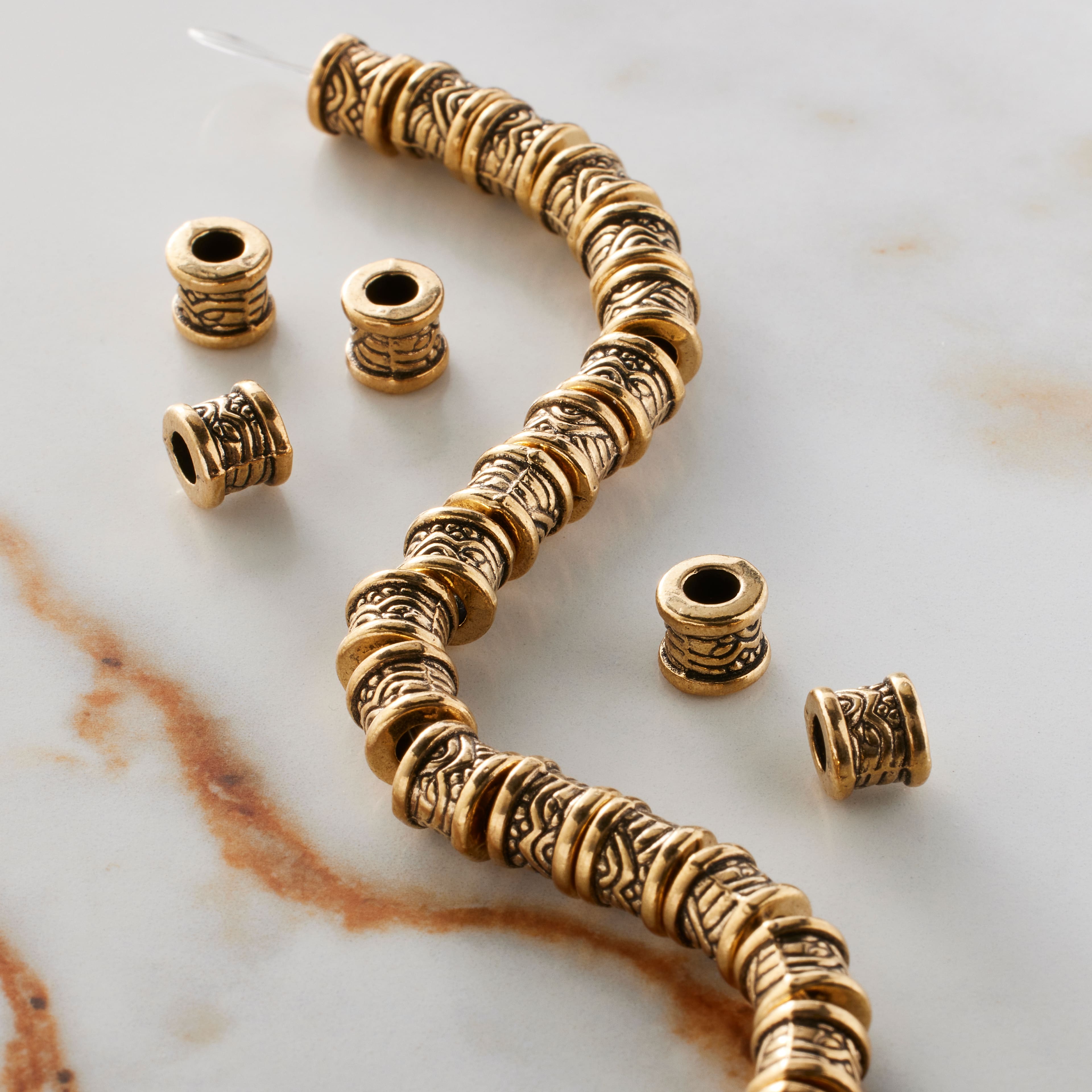 12 Pack: Antique Gold Metal Large Hole Tube Bead, 7.5mm by Bead Landing™