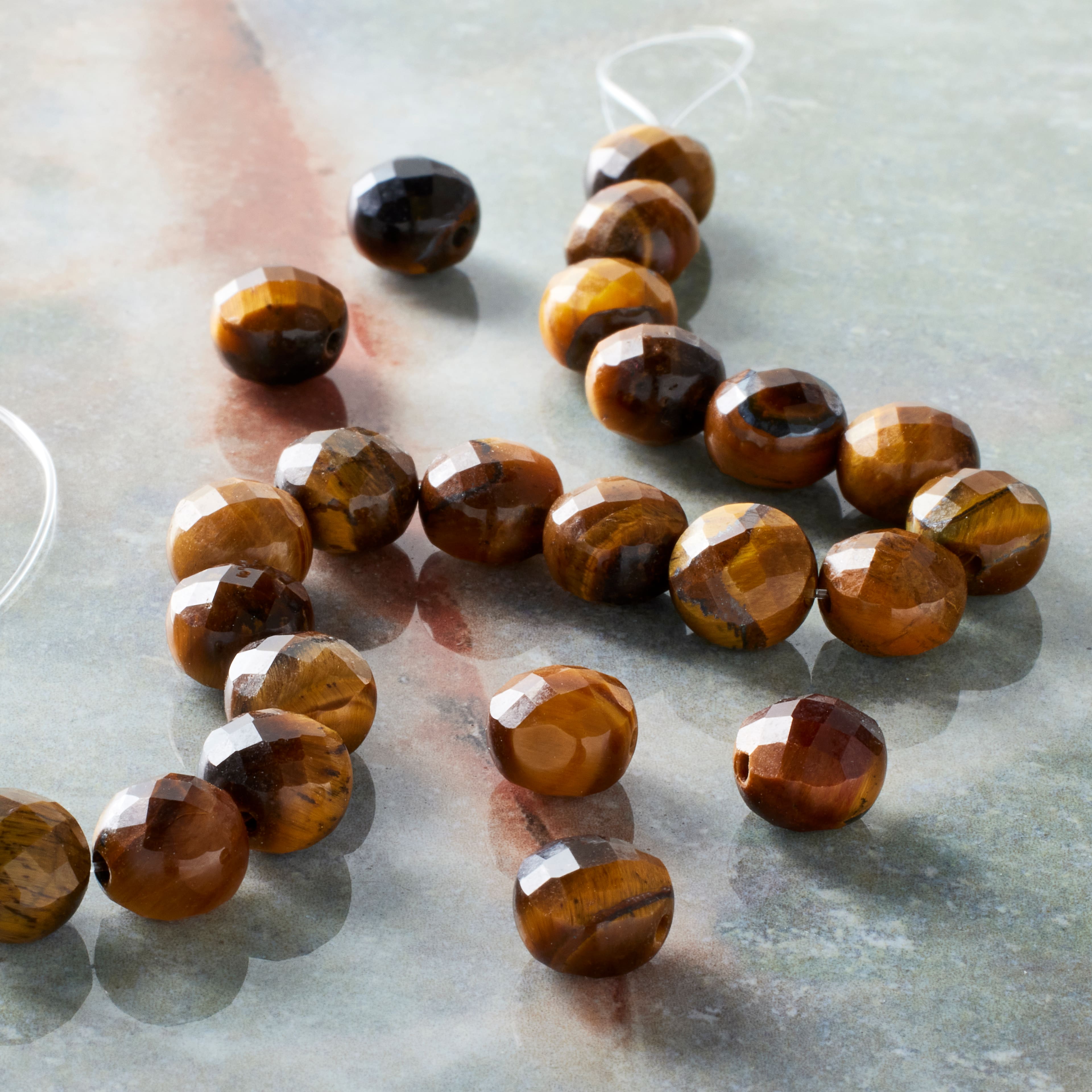 12 Pack: Yellow Tiger&#x27;s Eye Faceted Coin Beads by Bead Landing&#x2122;