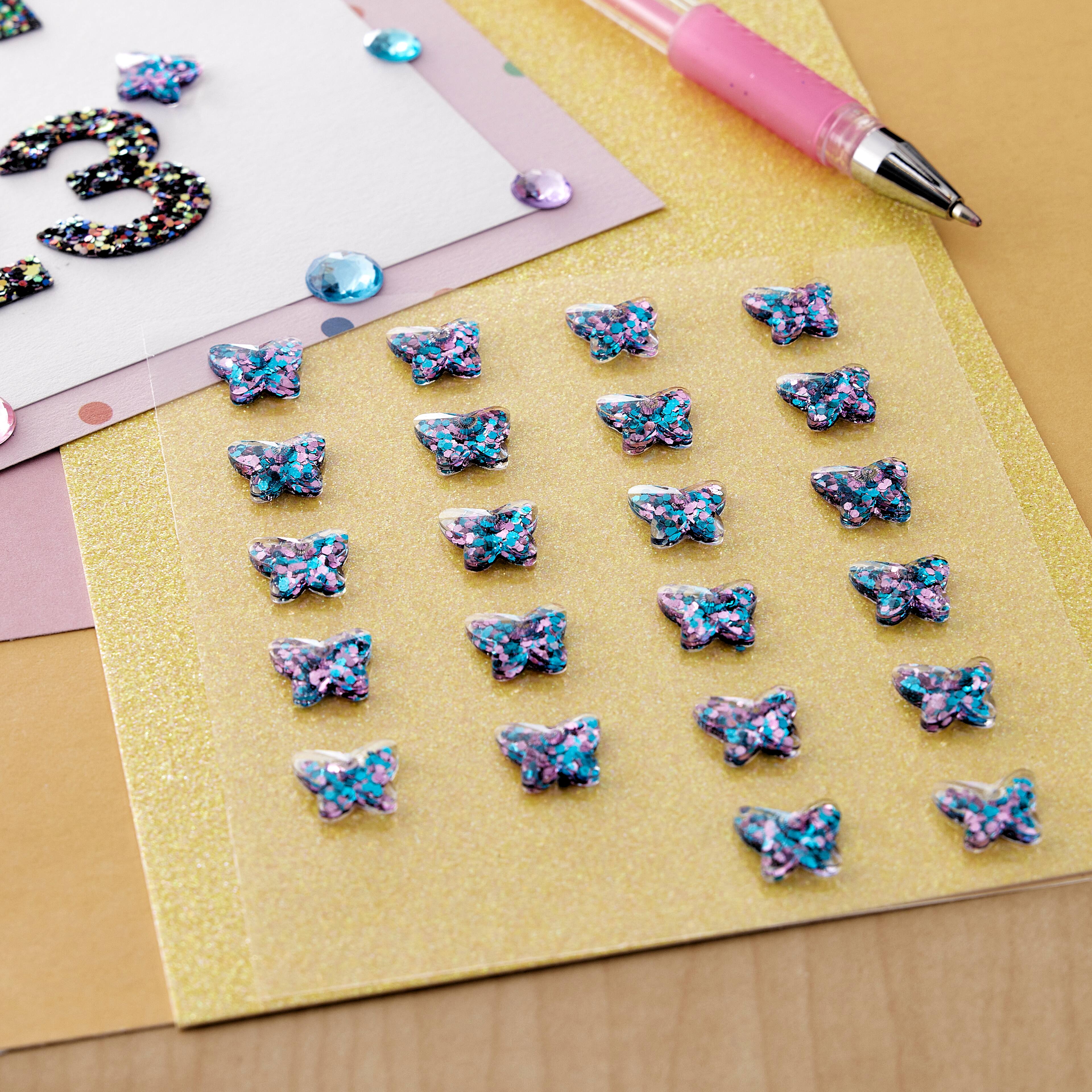 12 Packs: 24 ct. (288 total) Blue & Pink Iridescent Butterfly Bling Stickers by Recollections™
