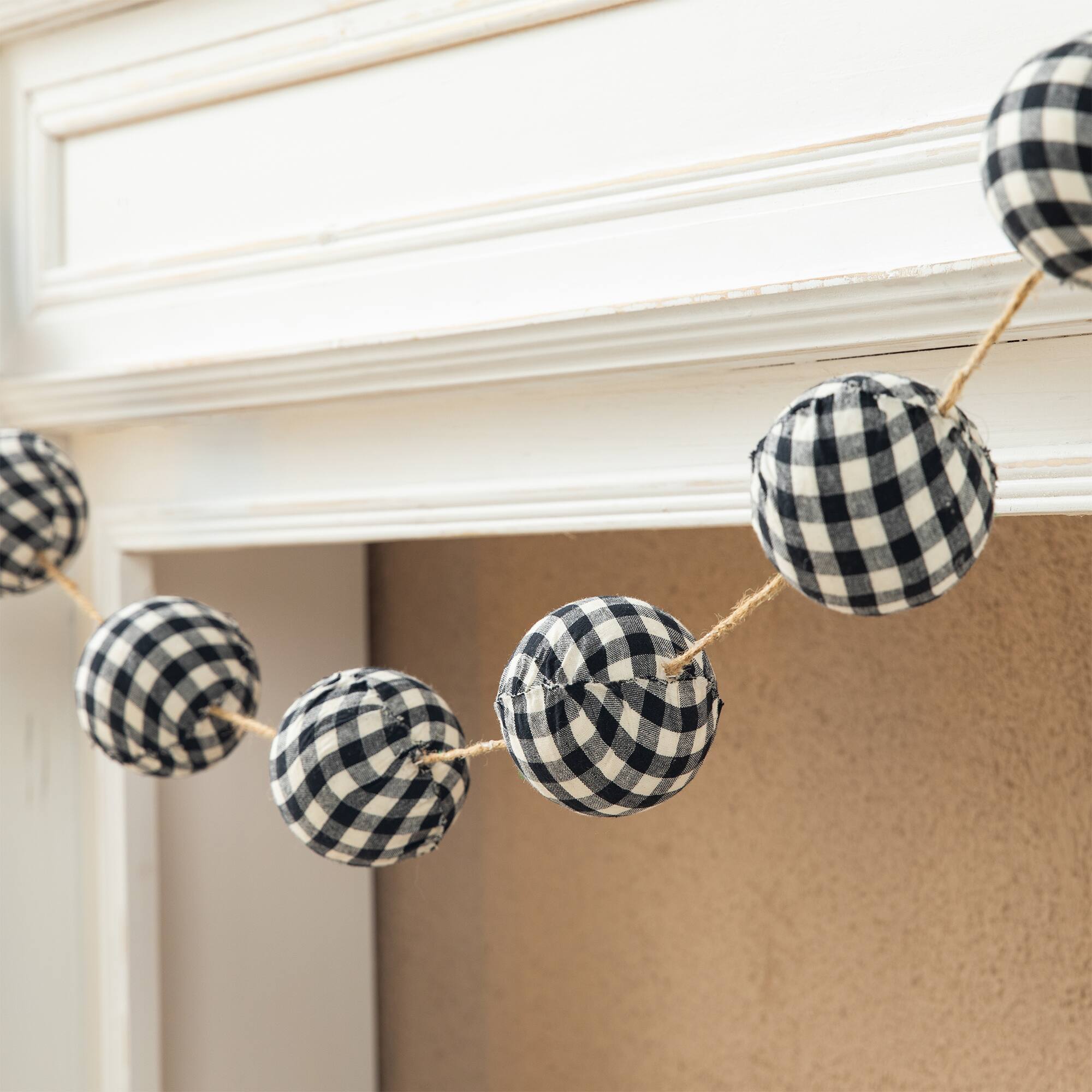 Glitzhome&#xAE; 6ft. Black &#x26; White Plaid Fabric Garland