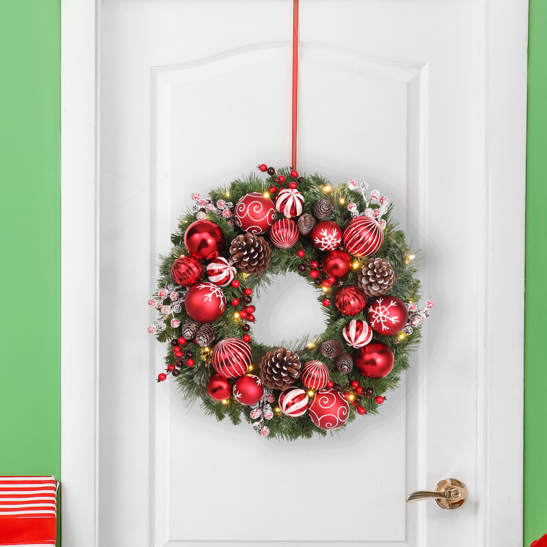 Haute Decor 26&#x22; Pre-Lit Holiday Times Red &#x26; White Ornament, Berry &#x26; Pinecone Wreath, Soft White LED Lights