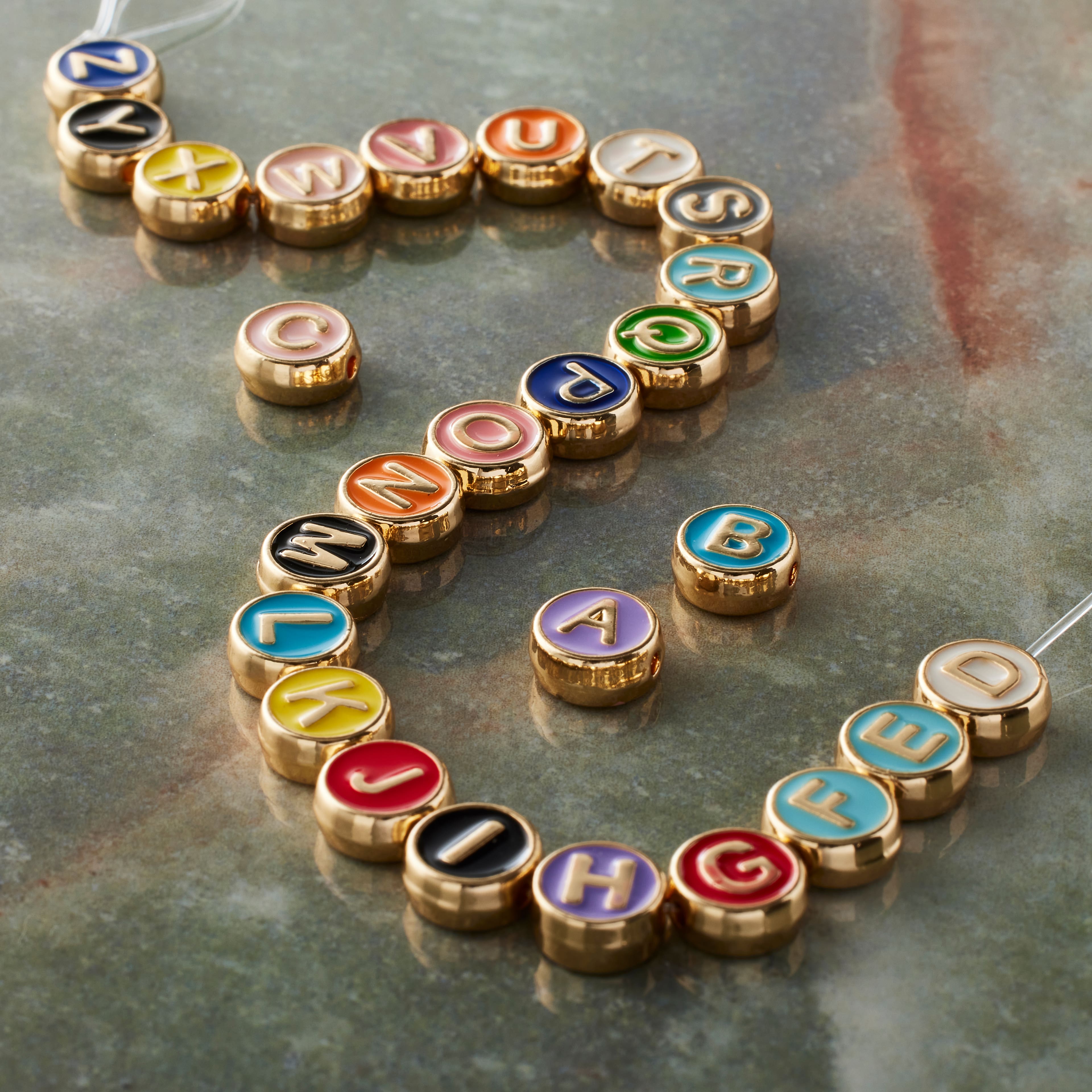 12 Packs: 26 ct. (312 total) Multicolor & Gold Alphabet Disc Beads, 8mm by Bead Landing™