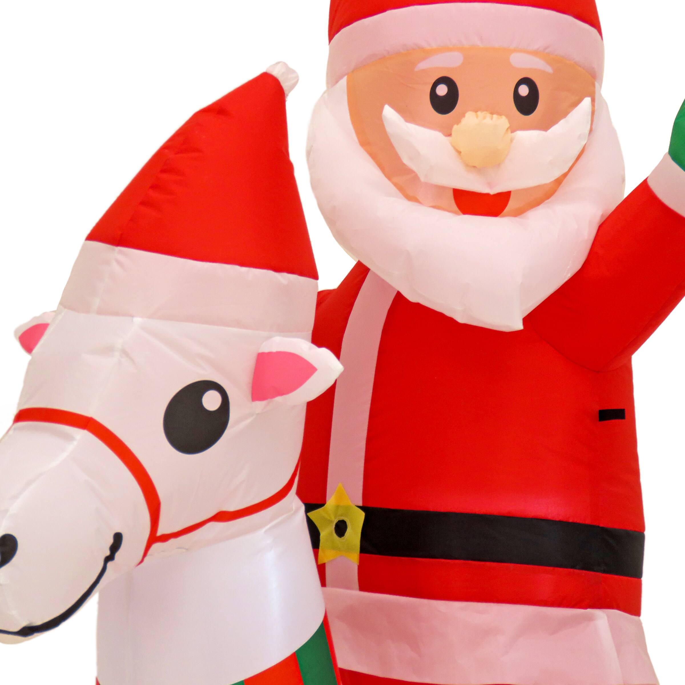 First Traditions&#x2122; 6ft. Red Inflatable Blow Up Santa on Rocking Horse with 3 Warm White UL LED Lights