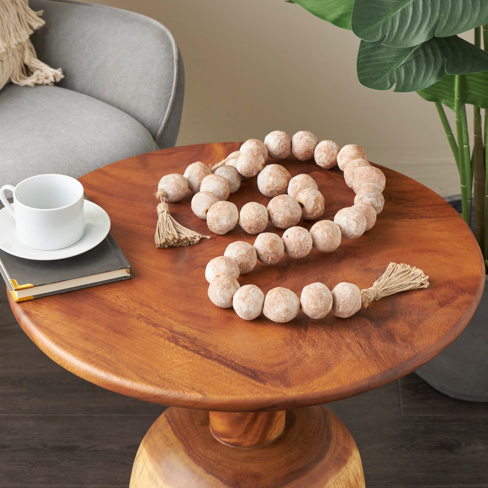 5ft. Paper Mache Round Distressed Beaded Garland with Tassel