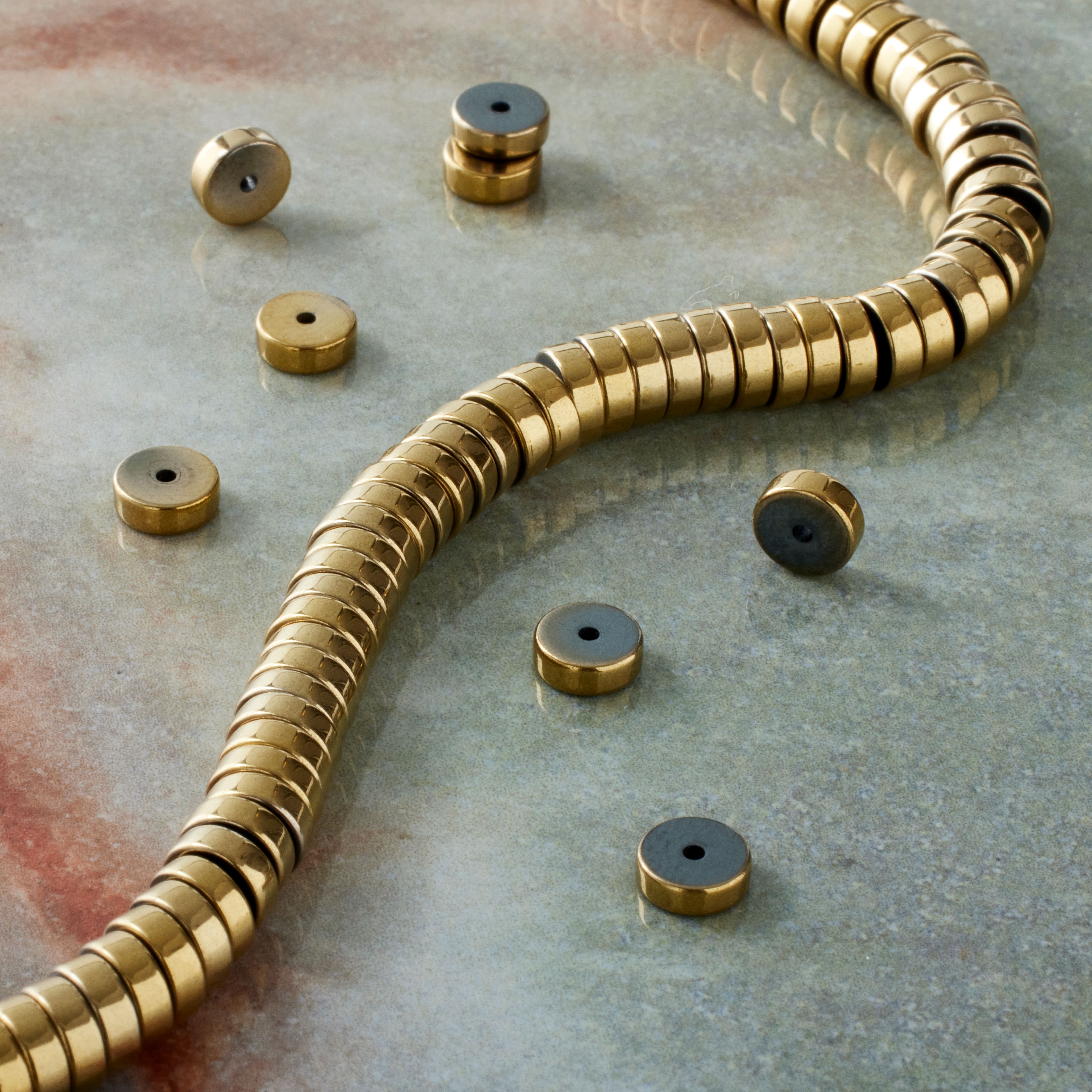 Gold Hematite Heishi Beads by Bead Landing&#x2122;
