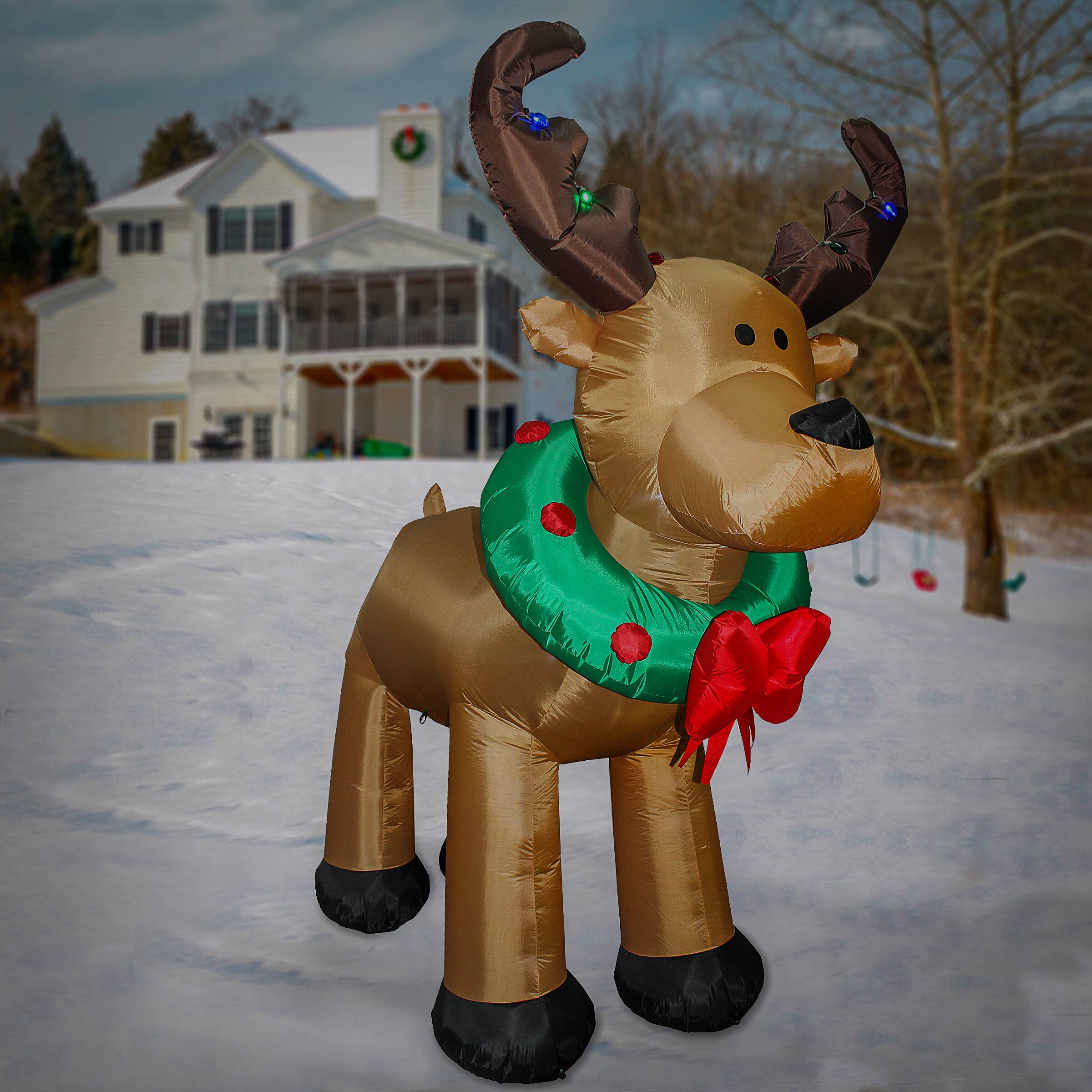 8ft. Pre-Lit Inflatable Reindeer with Wreath &#x26; Multicolor LED Lights