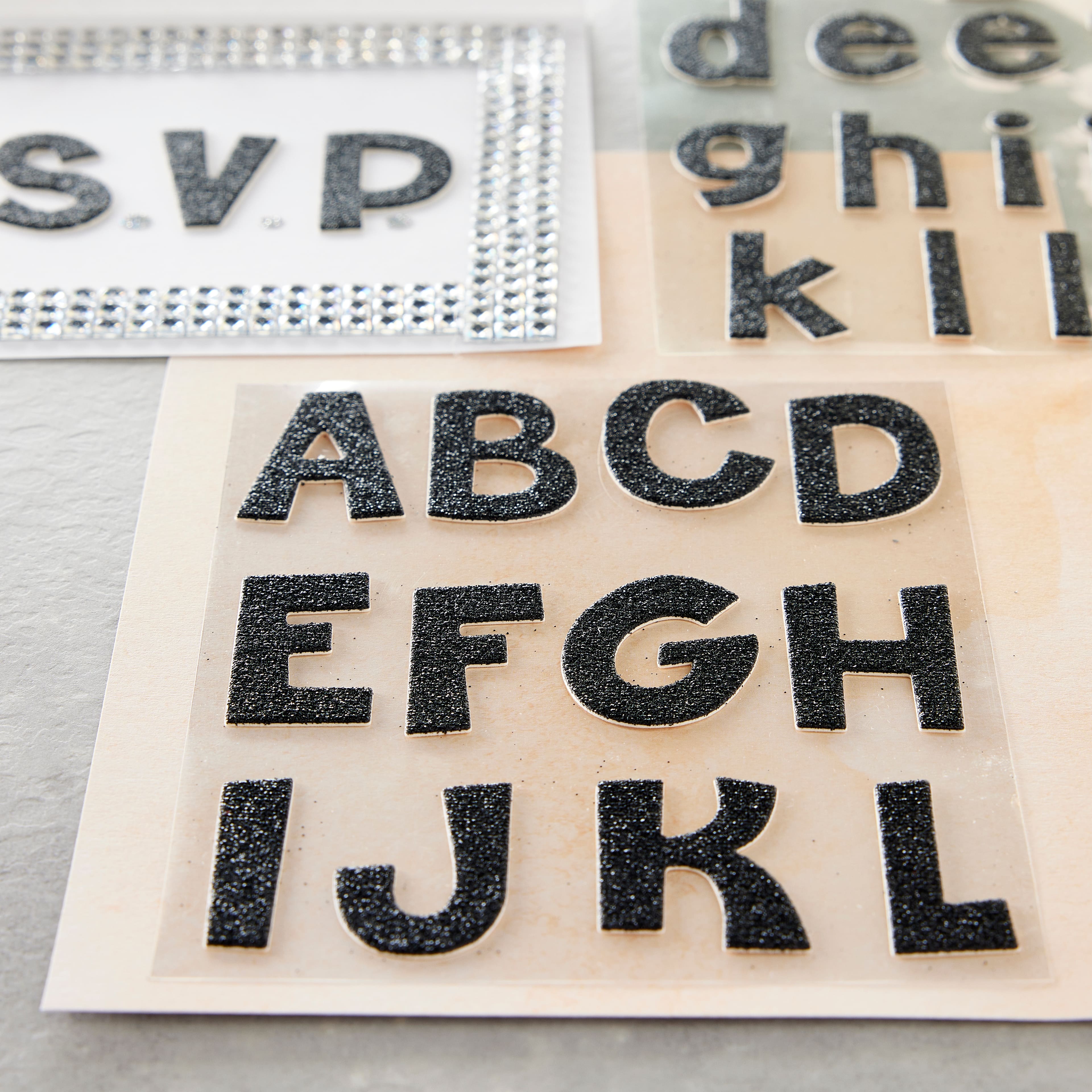 12 Pack: Black Glitter Alphabet Chipboard Stickers by Recollections™
