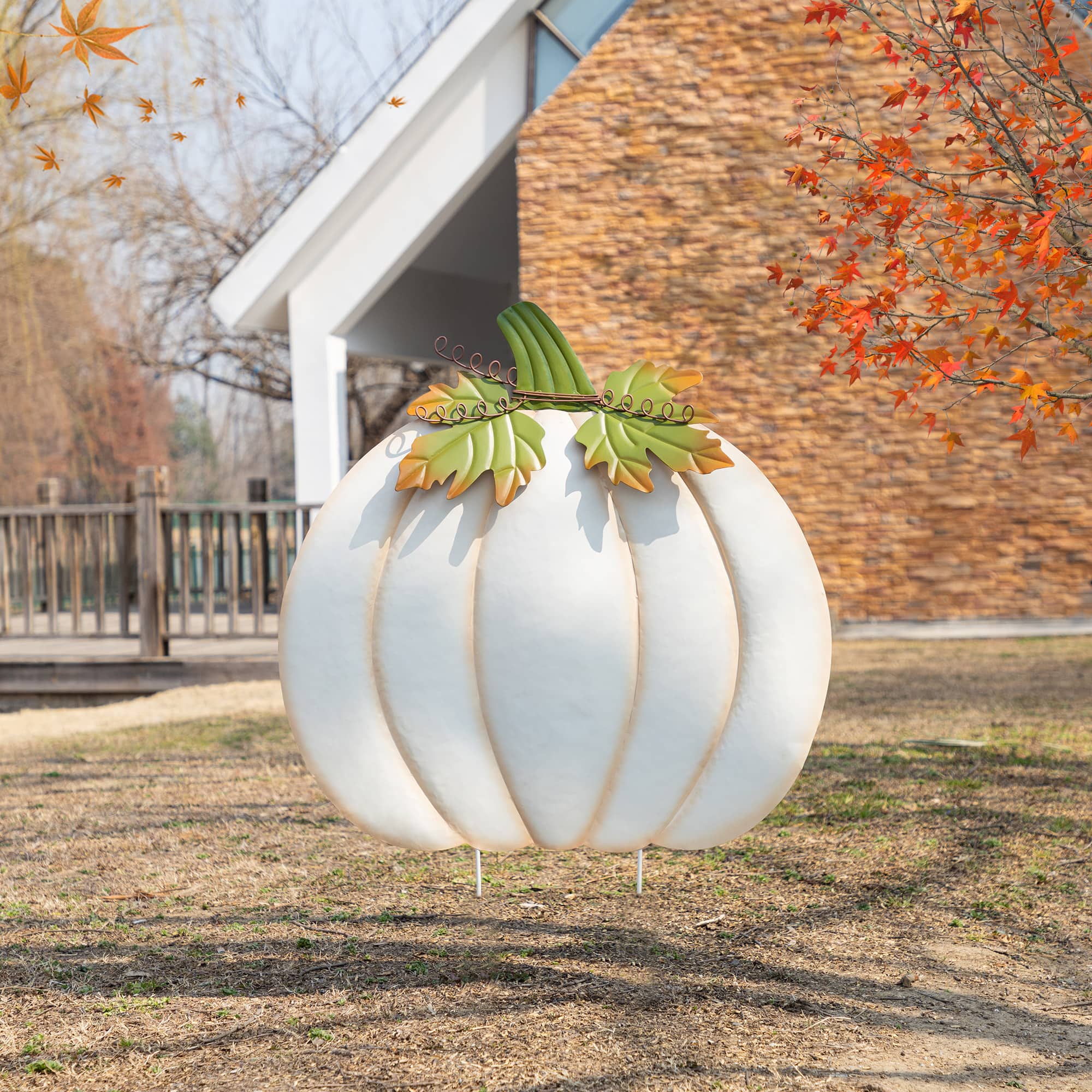 Glitzhome&#xAE; 39.5&#x22; Fall Oversized Metal Ivory Pumpkin Yard Stake, Wall or Standing Decor